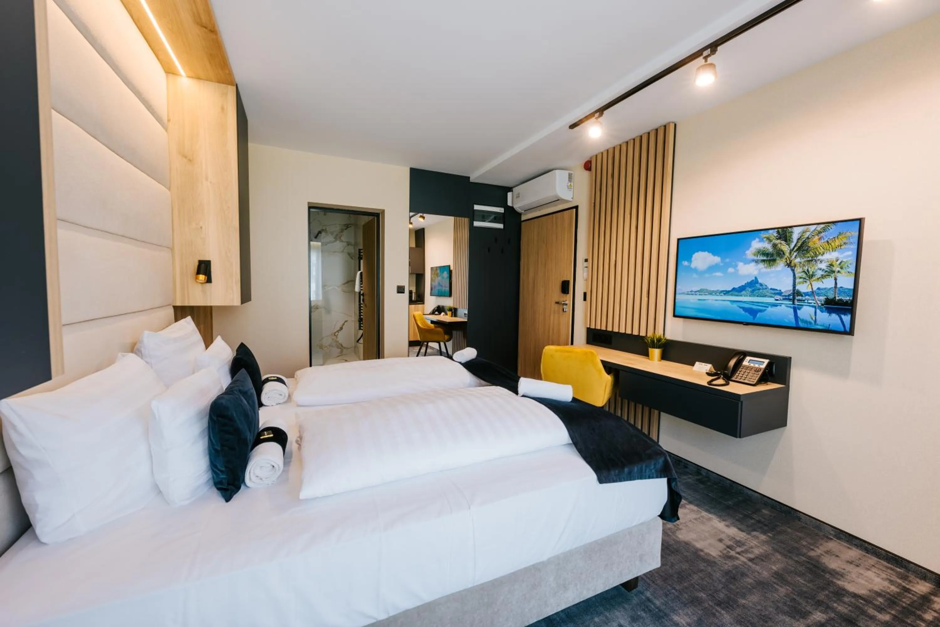 Living room, Bed in Hotel Auris