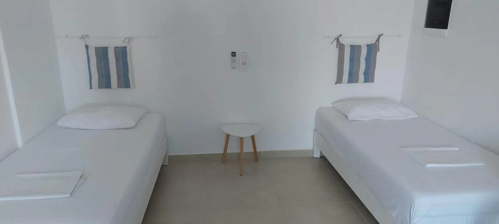 Bed in Telhinis Hotel & Apartments