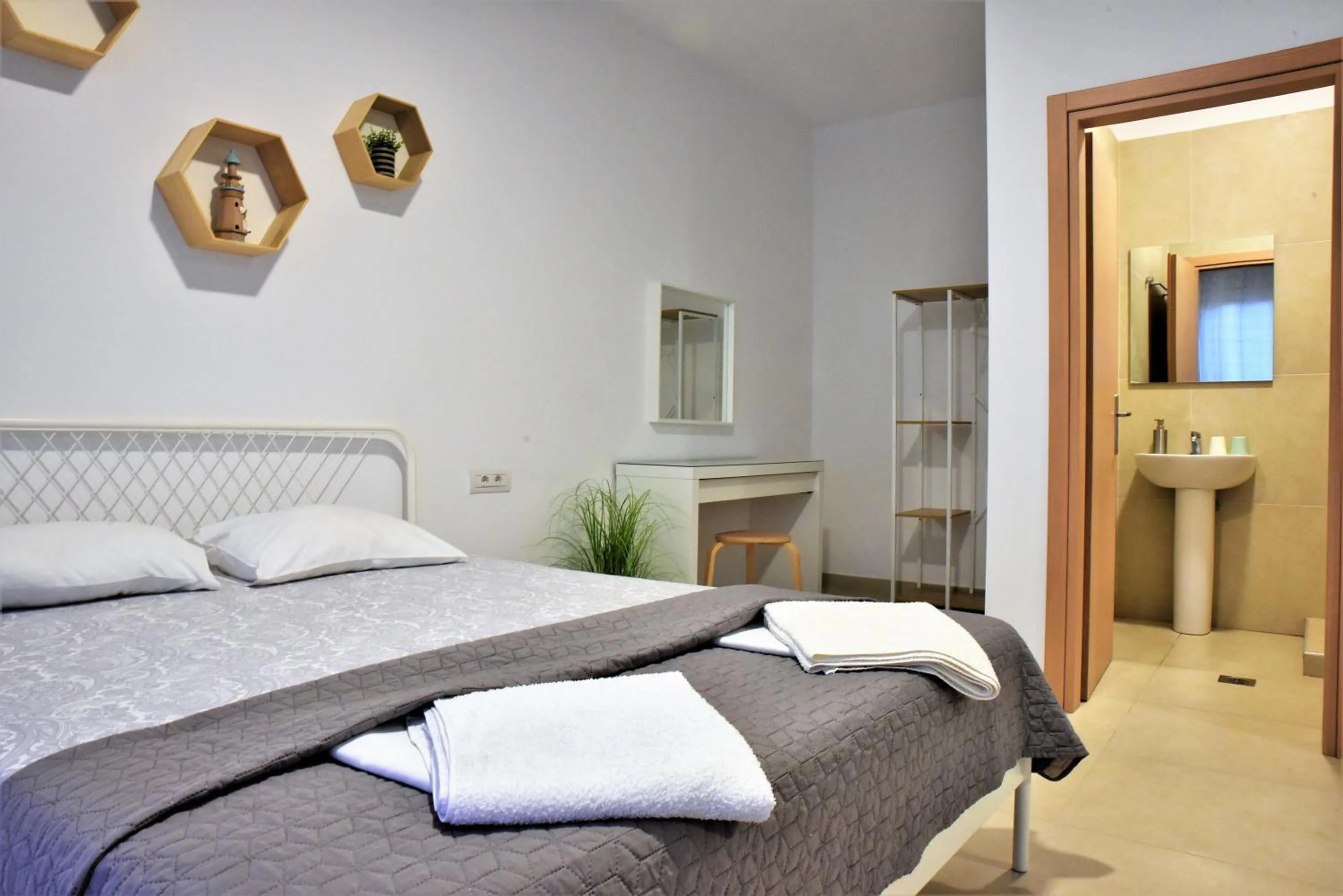 Bed in Telhinis Hotel & Apartments