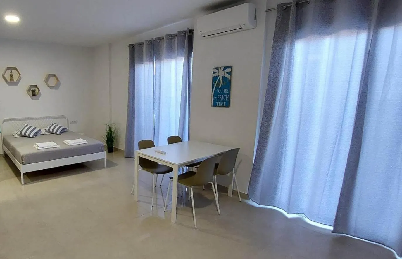 Bed in Telhinis Hotel & Apartments