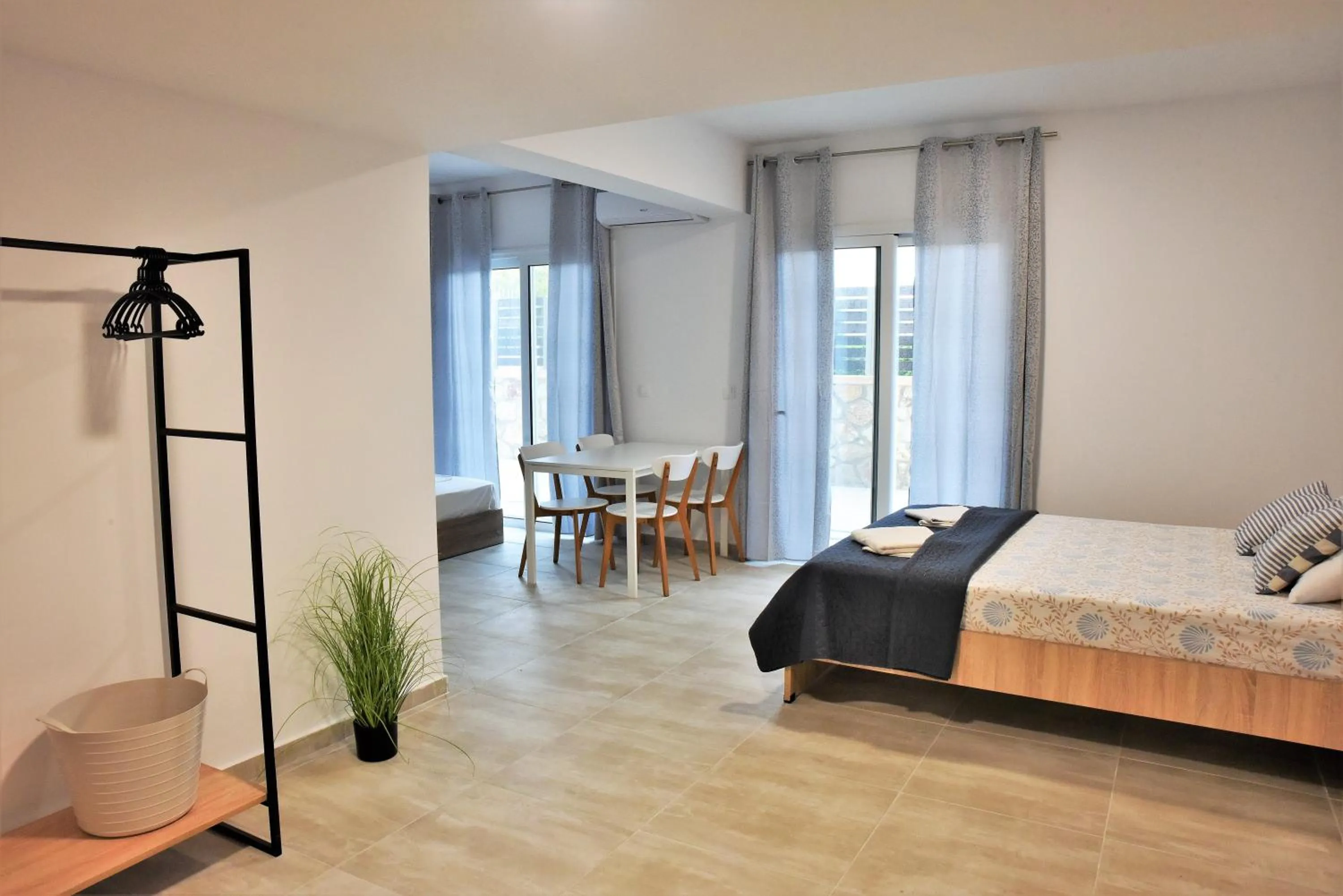 Bed in Telhinis Hotel & Apartments