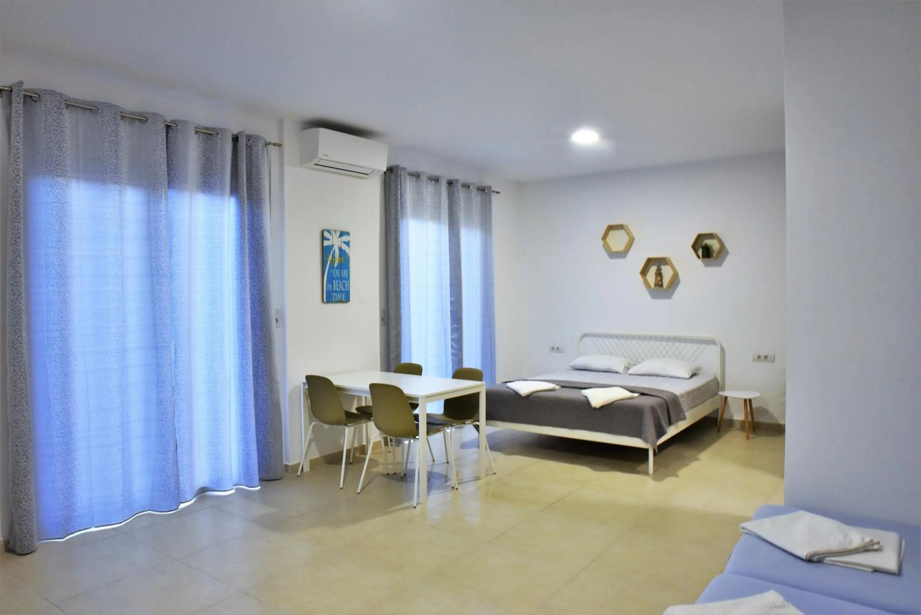 Bed in Telhinis Hotel & Apartments