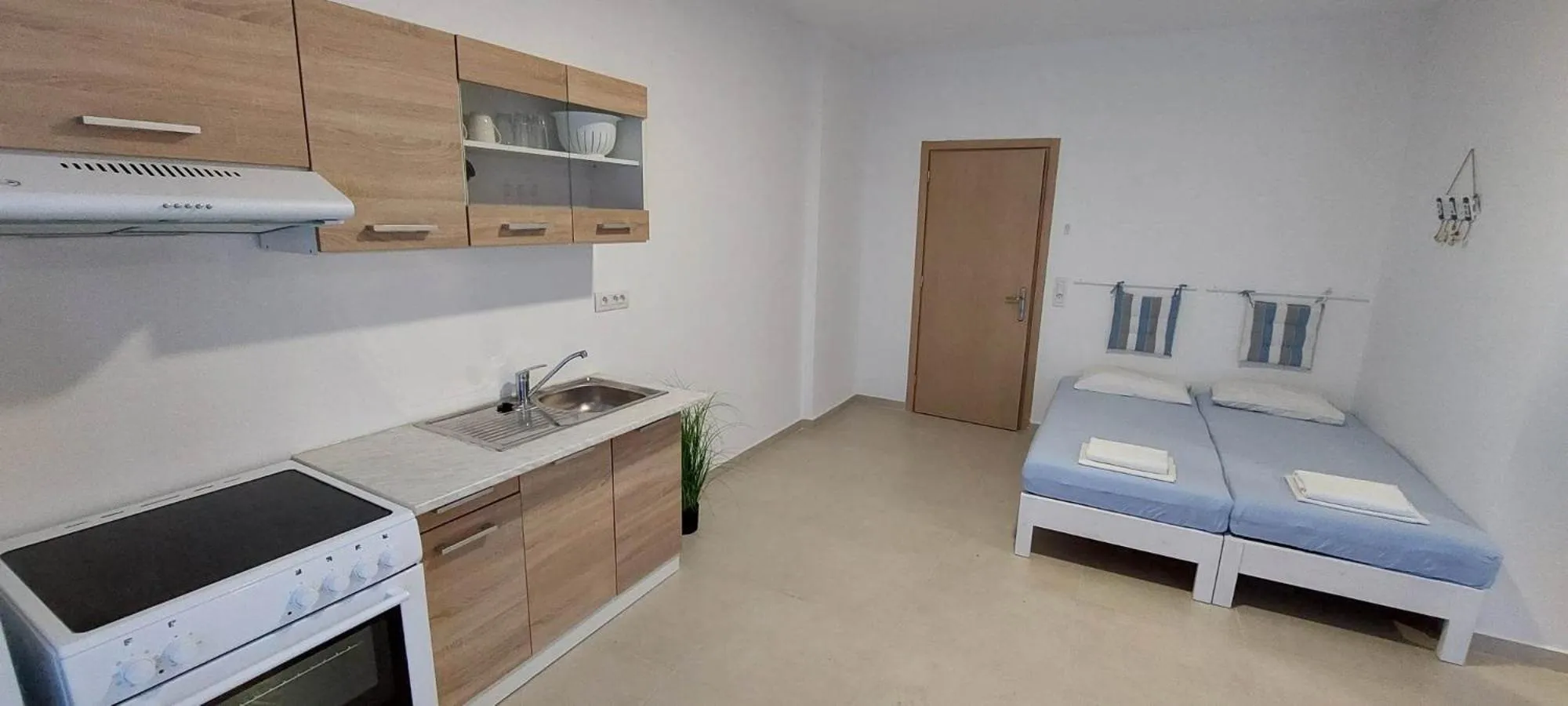 Kitchen or kitchenette, Bed in Telhinis Hotel & Apartments