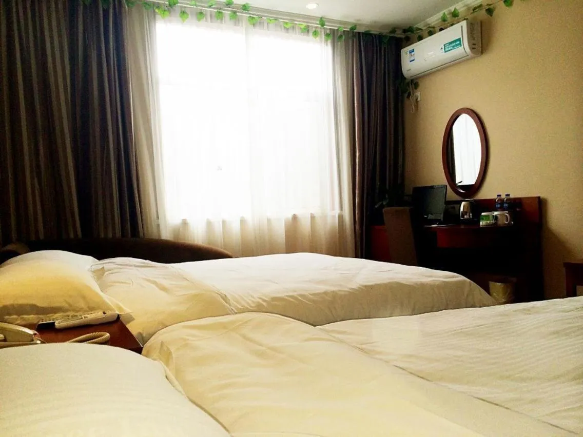 Bed in GreenTree Inn Fuyang Shopping Mall