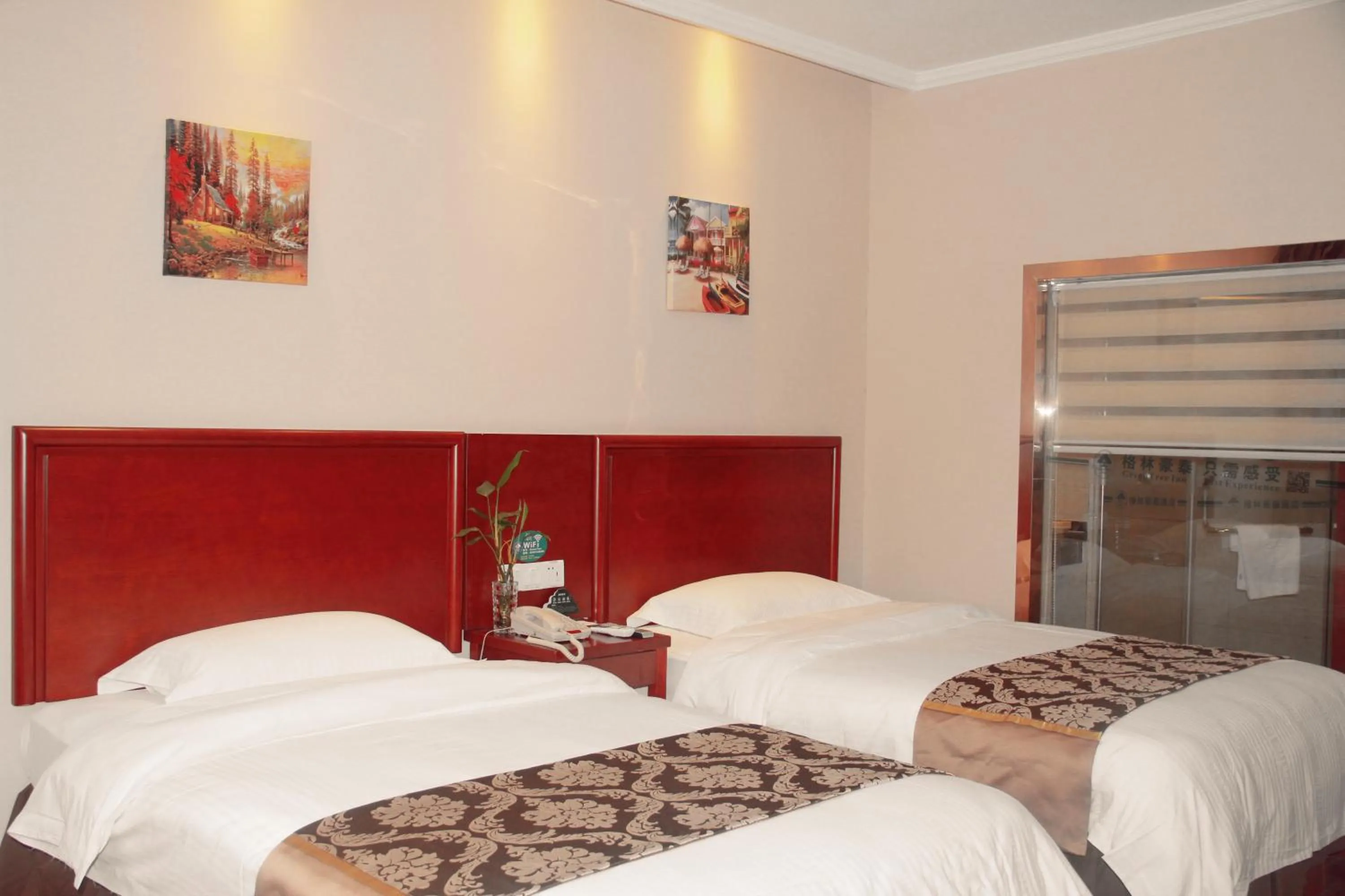 Bed in GreenTree Inn Fuyang Shopping Mall