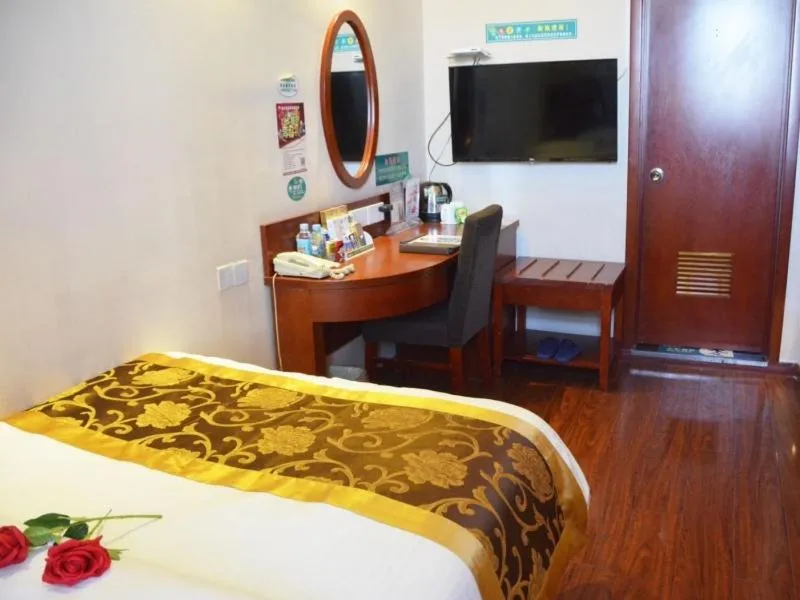 Bed in GreenTree Inn Fuyang Shopping Mall