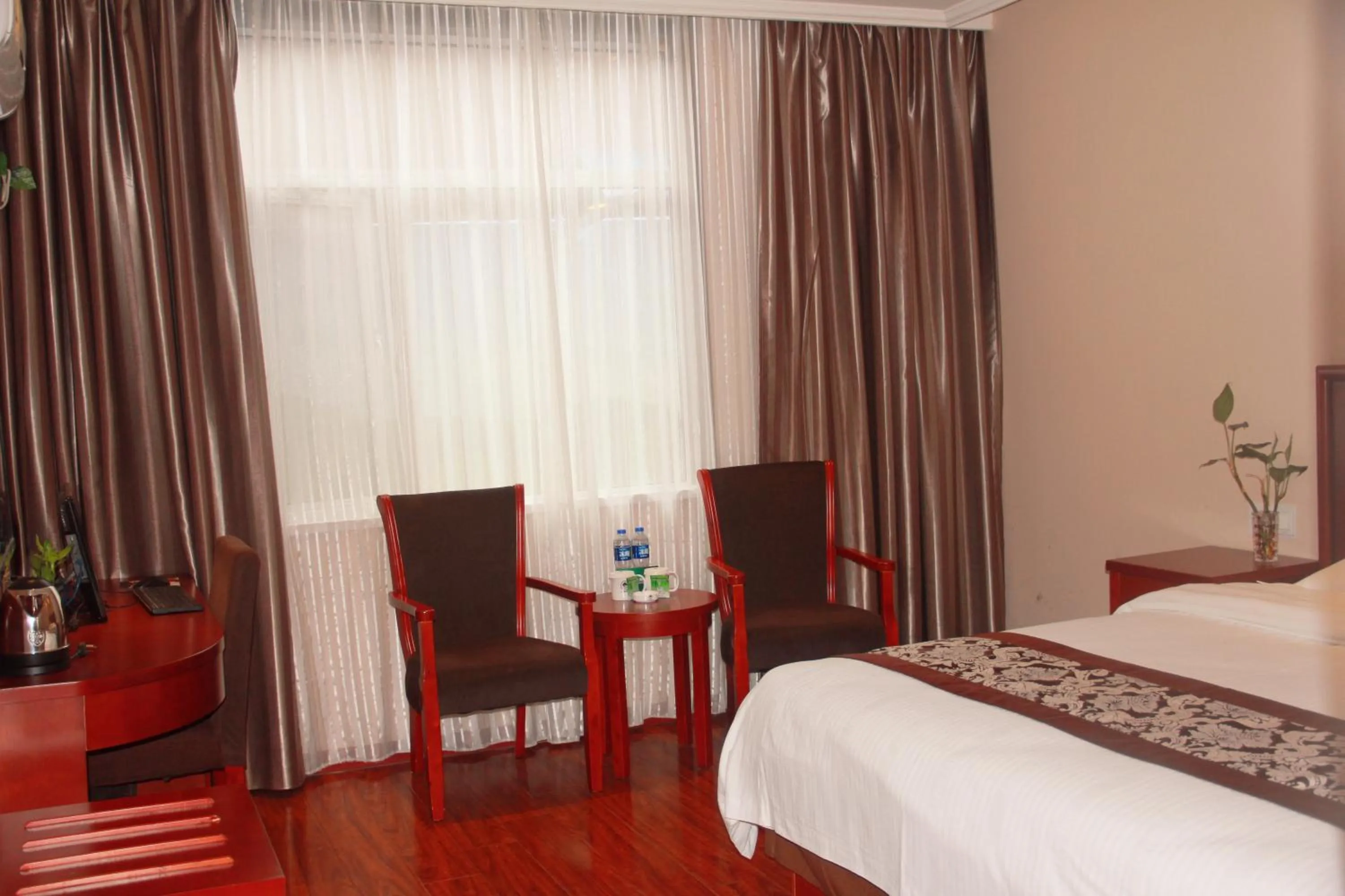 Bed in GreenTree Inn Fuyang Shopping Mall