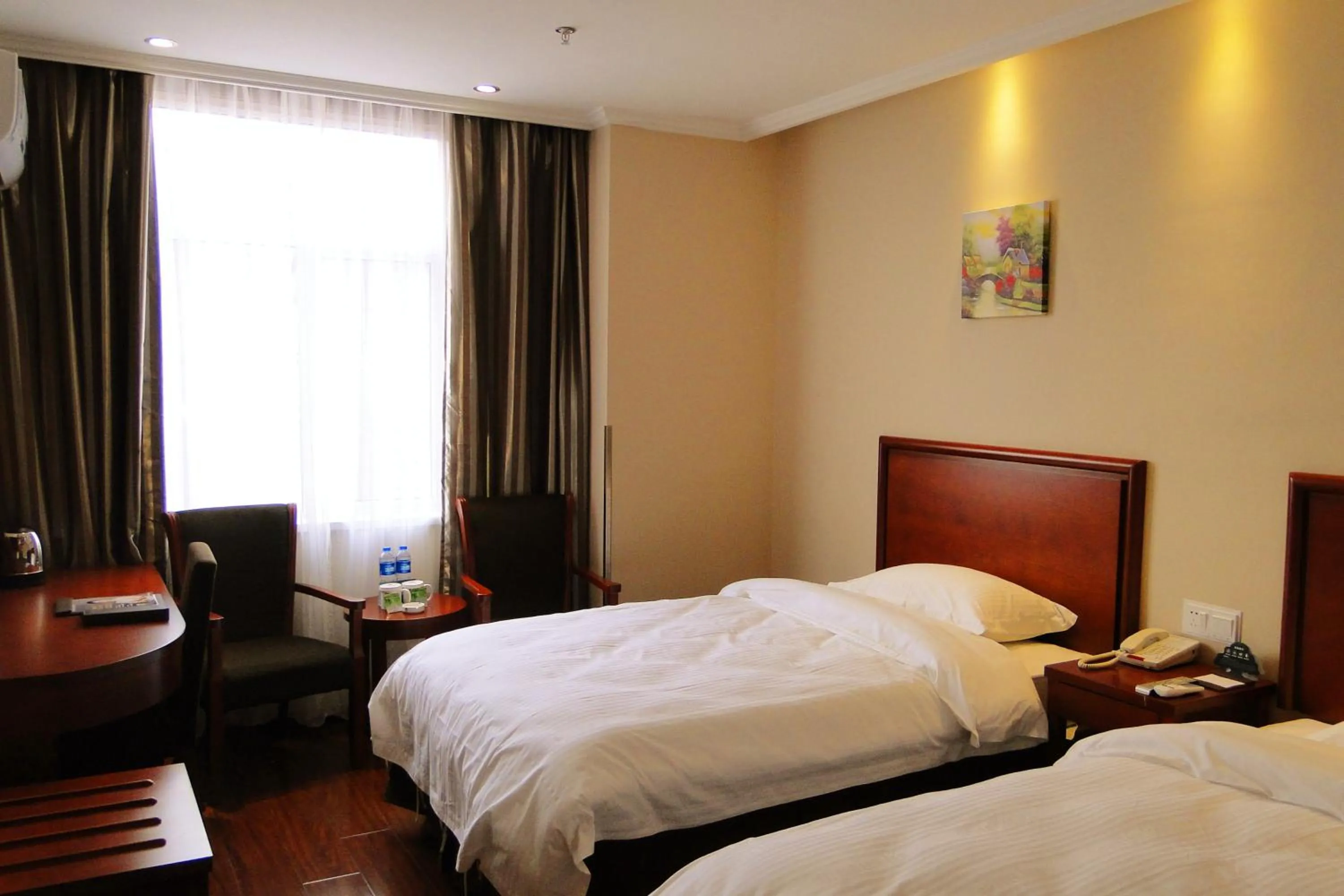 Bed in GreenTree Inn Fuyang Shopping Mall