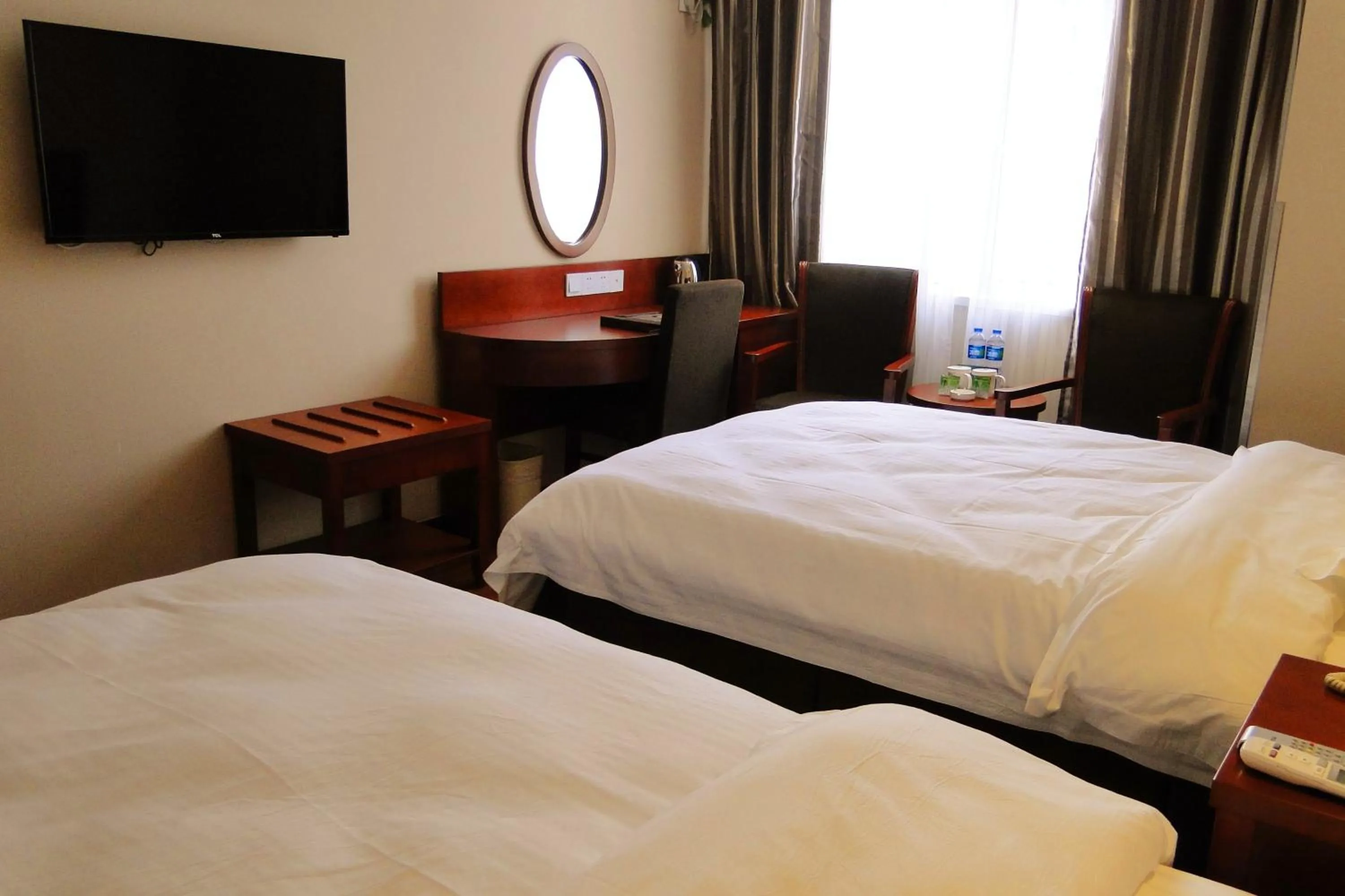 Bed in GreenTree Inn Fuyang Shopping Mall