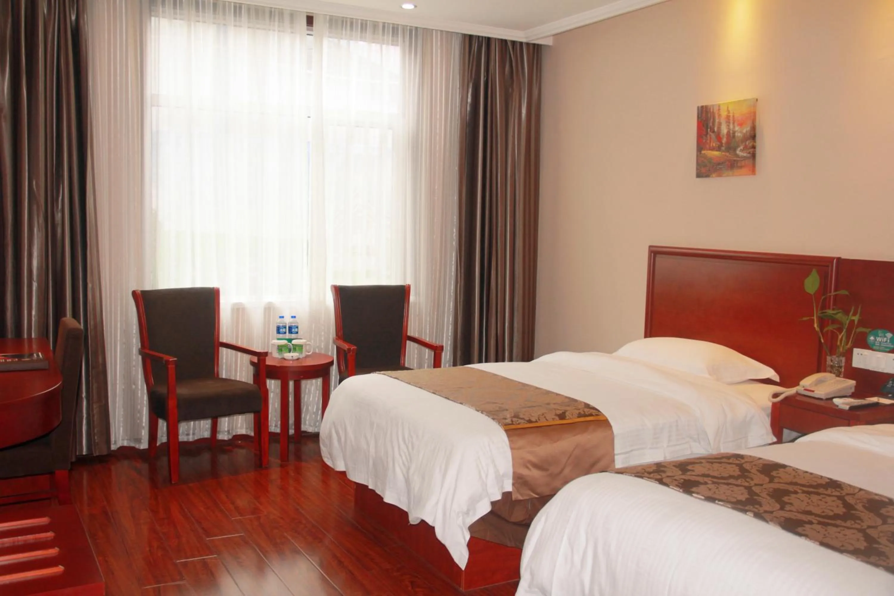 Bed in GreenTree Inn Fuyang Shopping Mall