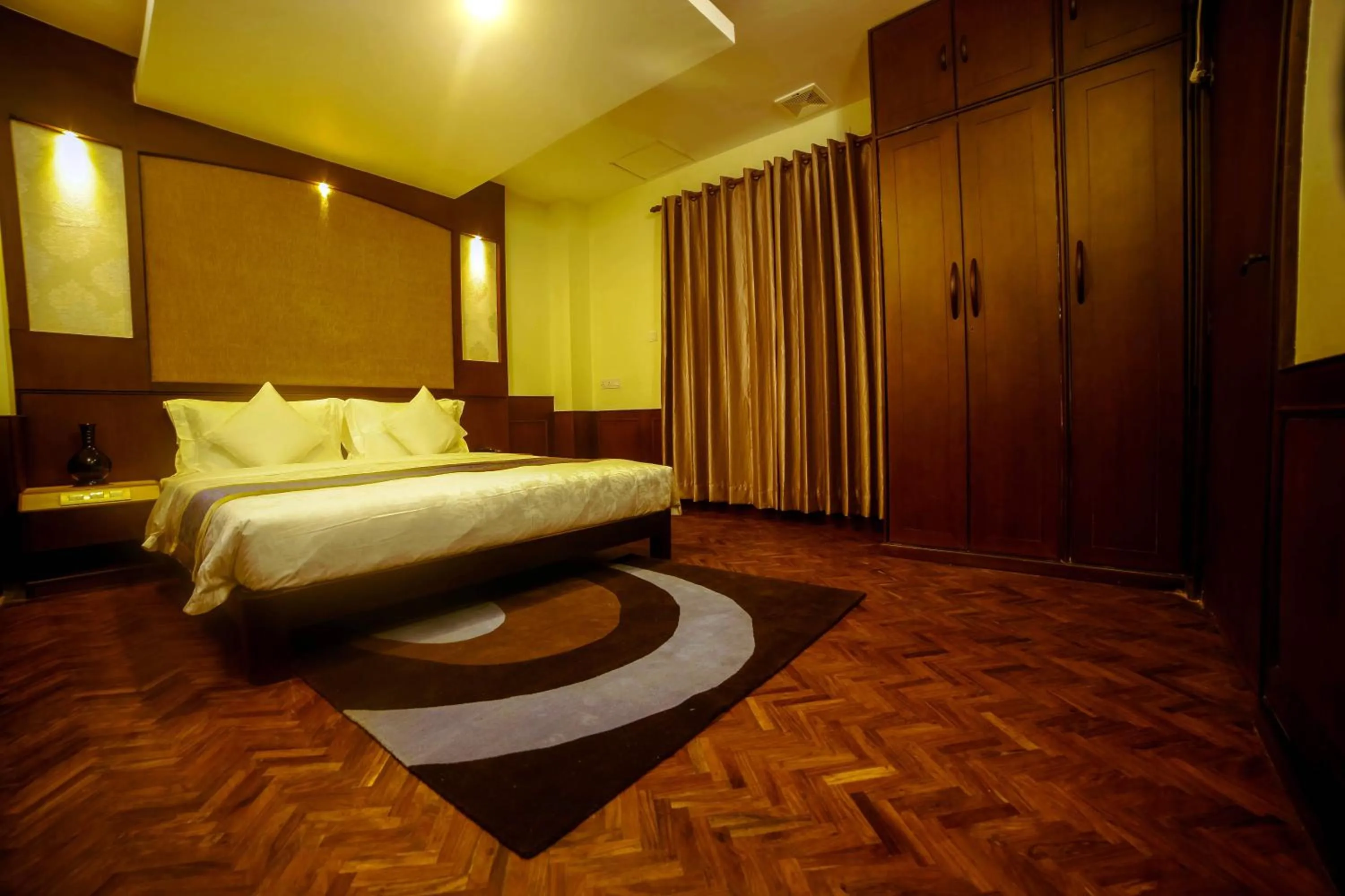 Bed in Dahlia Boutique Hotel