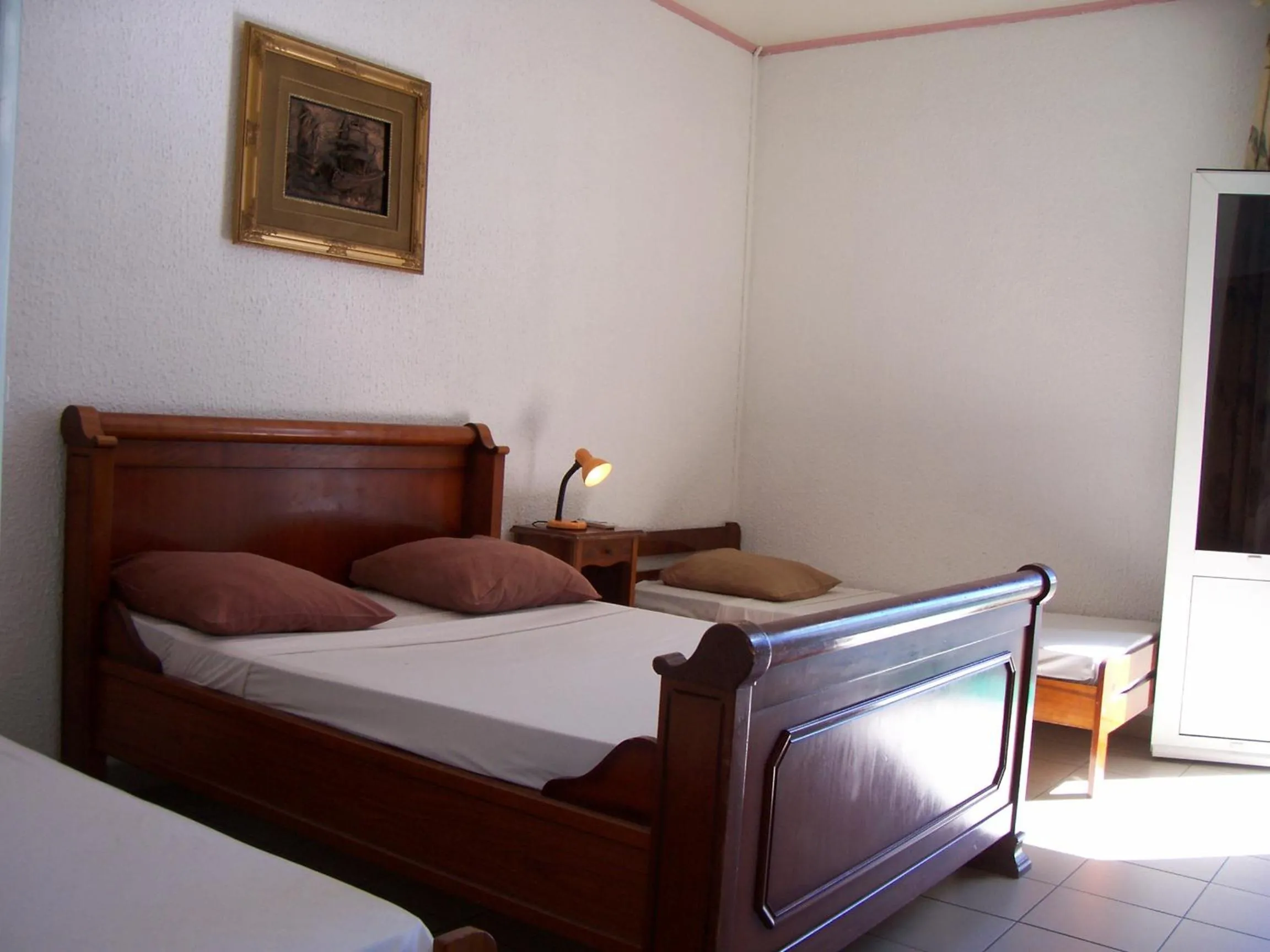 Bed in Hôtel Le Nathania