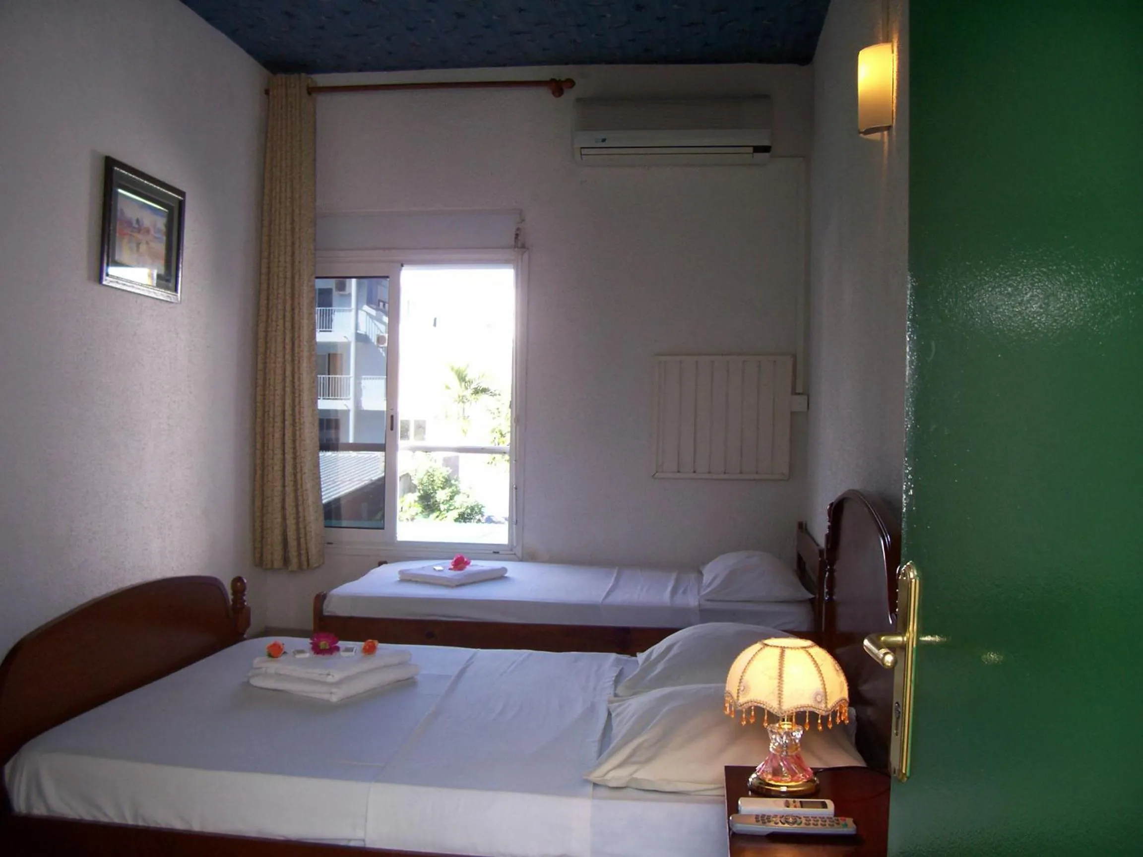 Bed in Hôtel Le Nathania