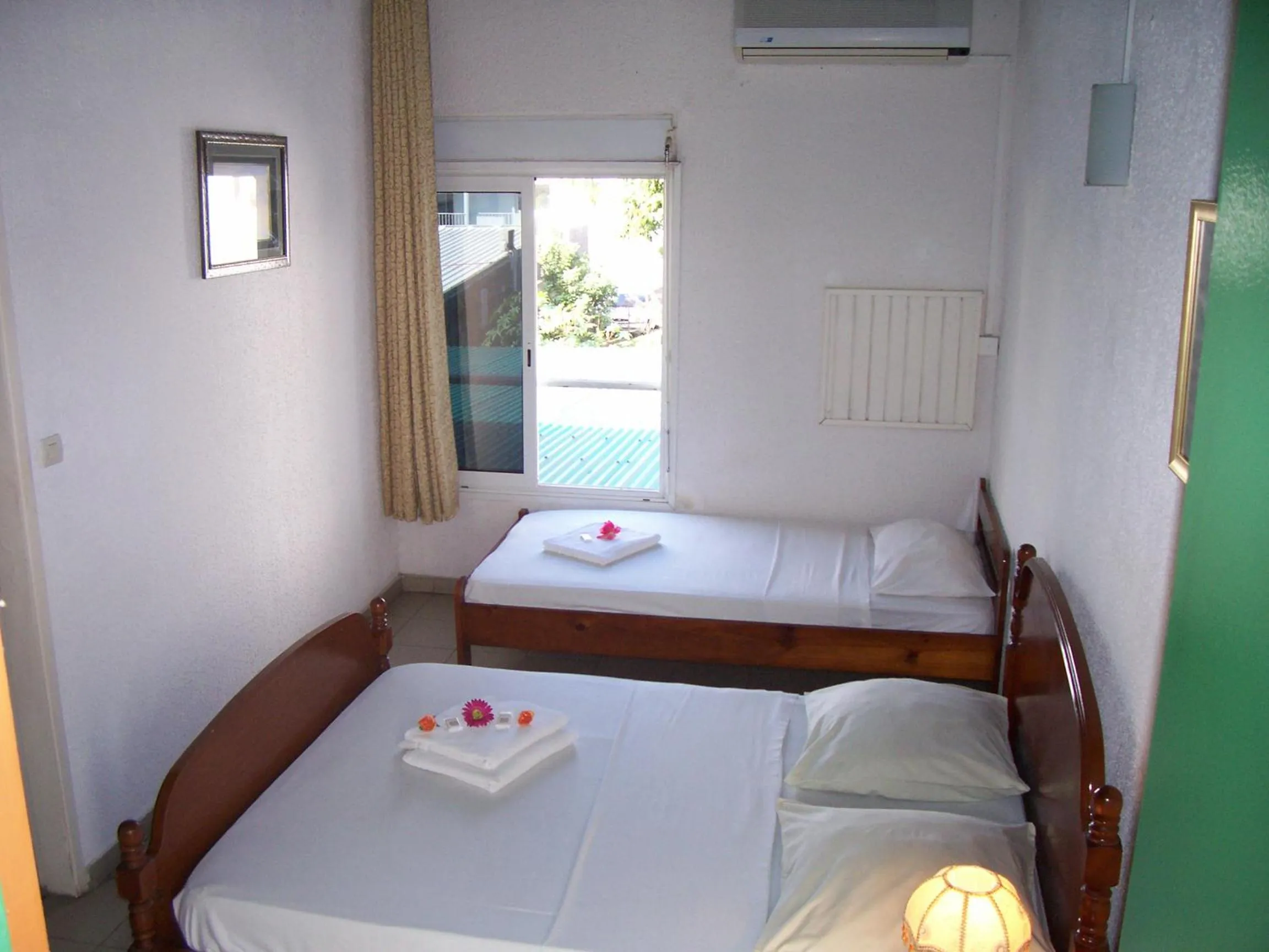 Bed in Hôtel Le Nathania