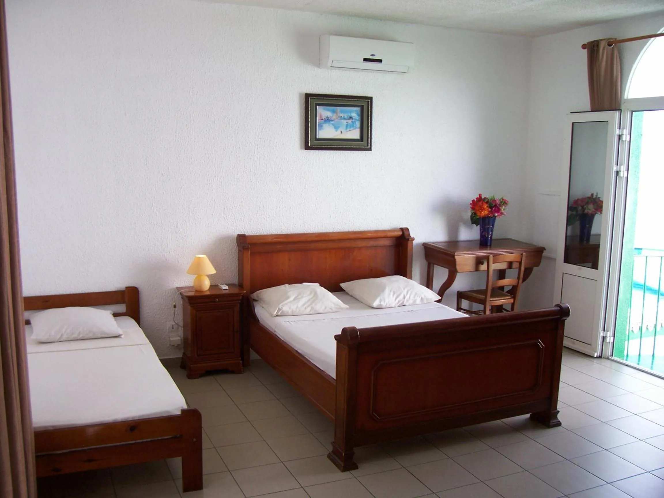 Bed in Hôtel Le Nathania