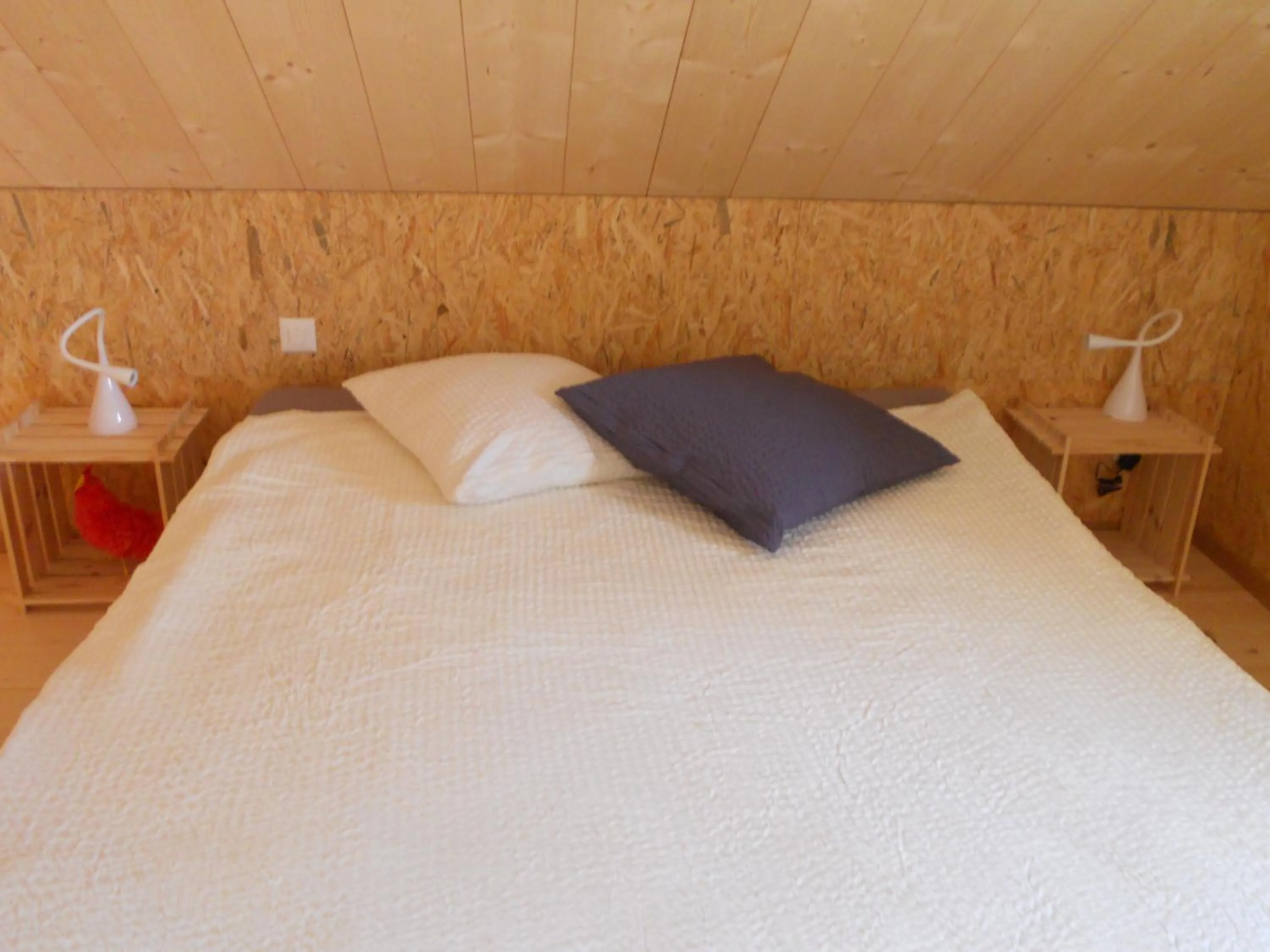 Bed in Gîte Chez Toinette
