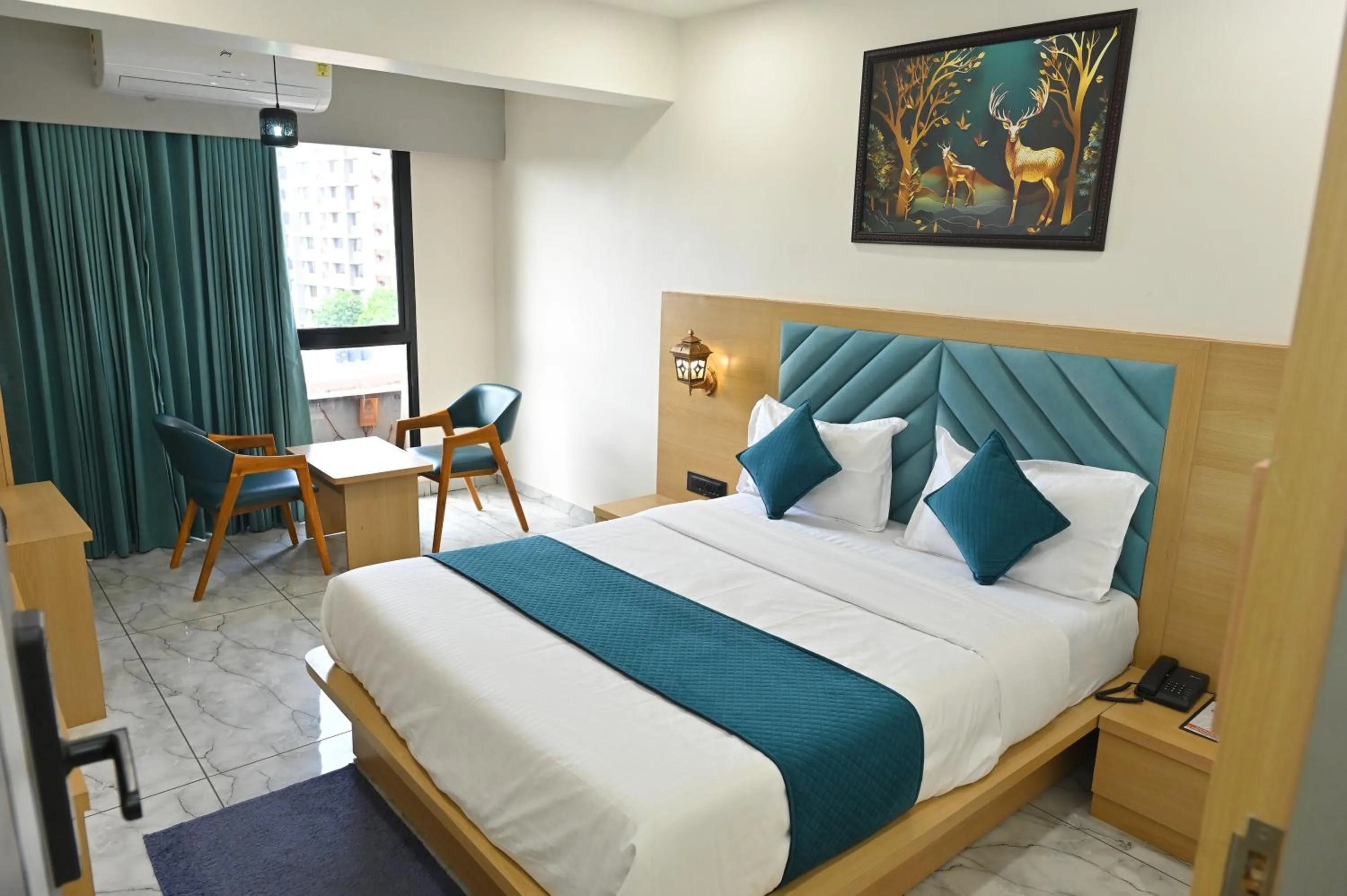 Bedroom in Hotel Revanta Inn