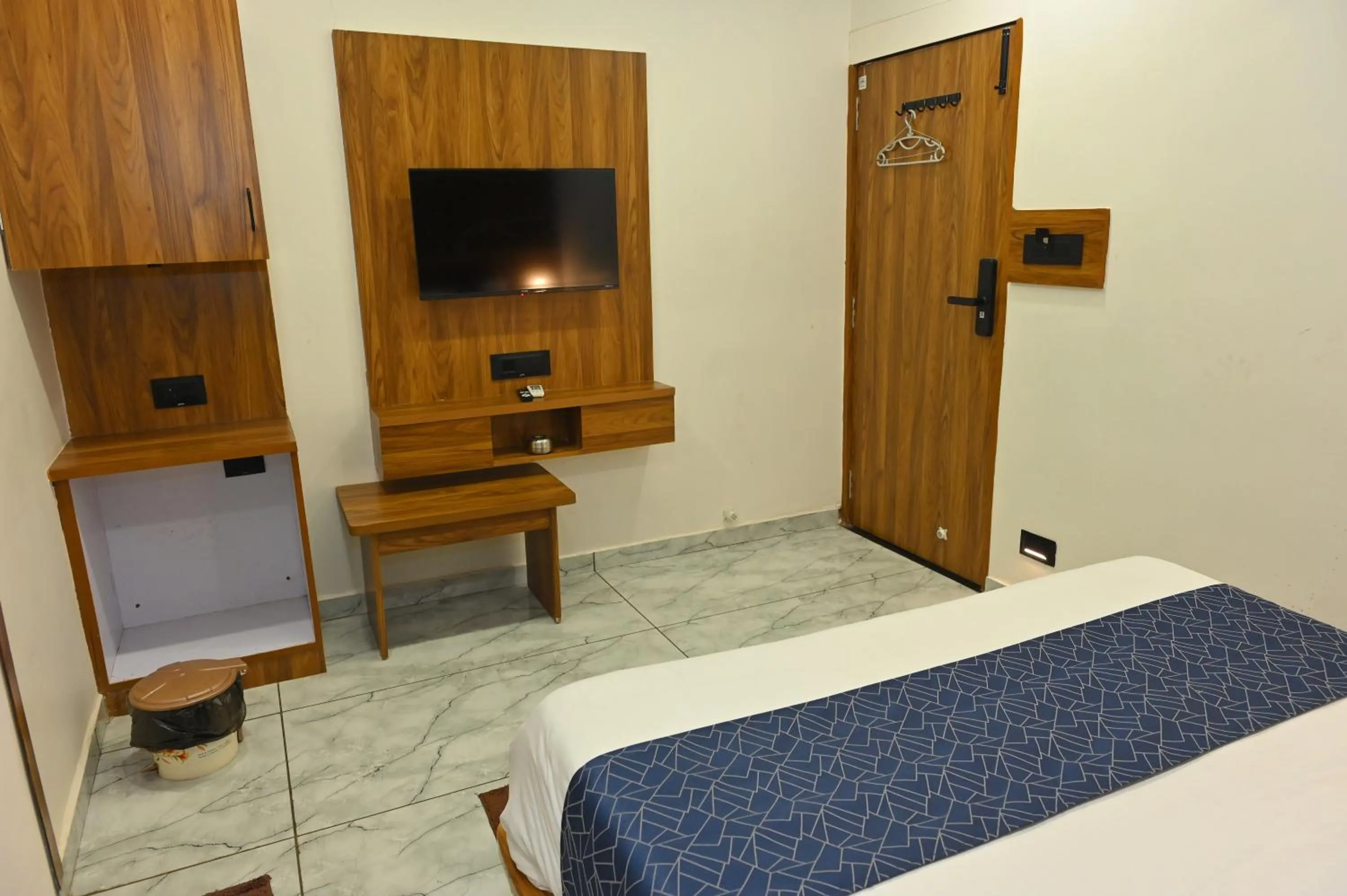 Bedroom in Hotel Revanta Inn
