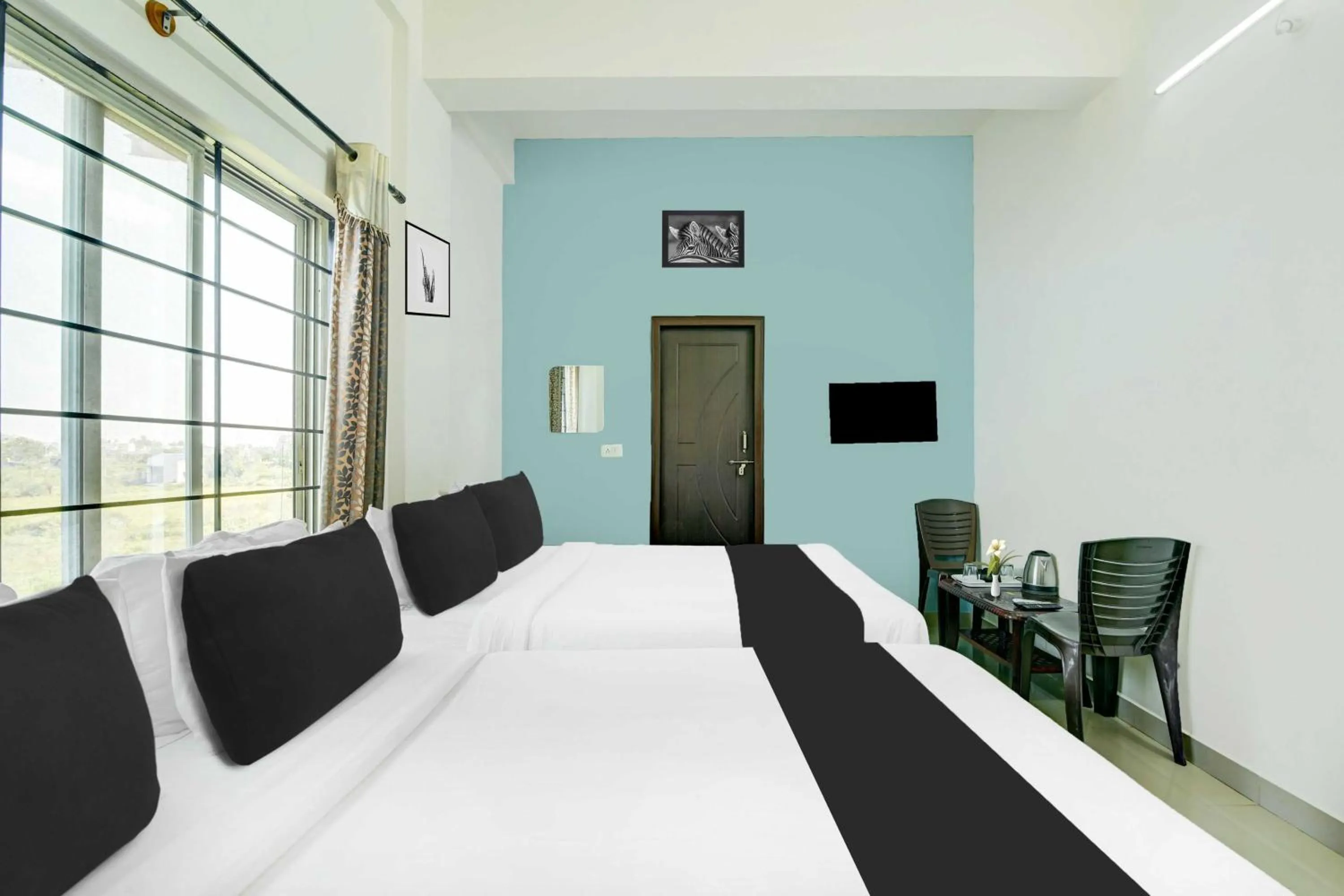 Bedroom, Bed in Hotel O Chikmangaluru Near Railway Station