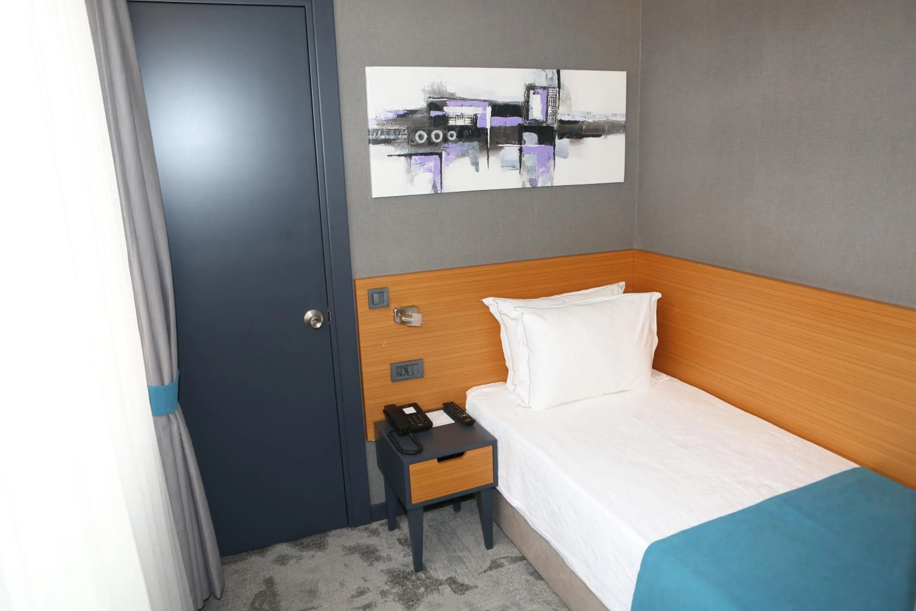 Bed in Sapko Airport Hotel