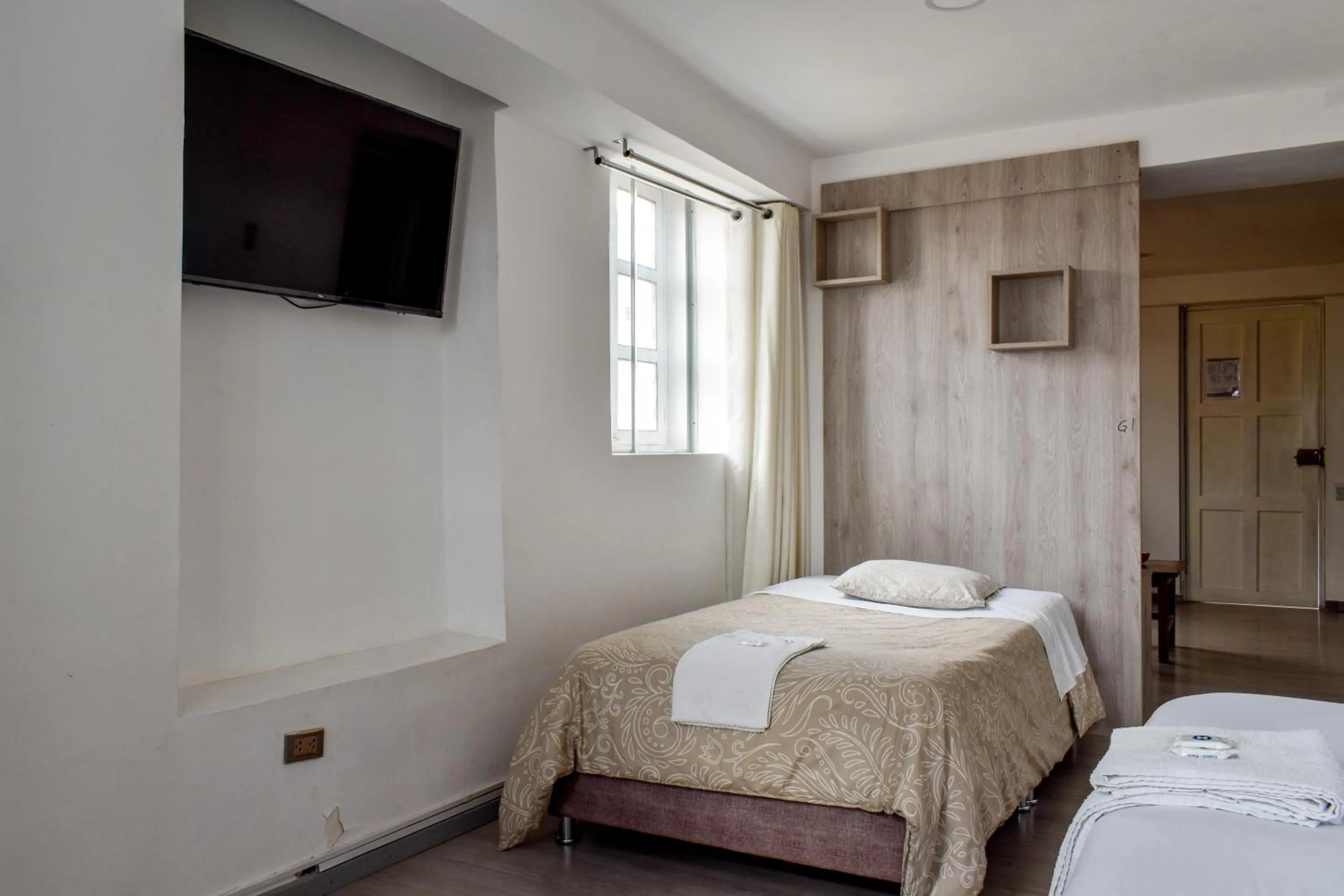 Bed in Apart Hotel El Puma