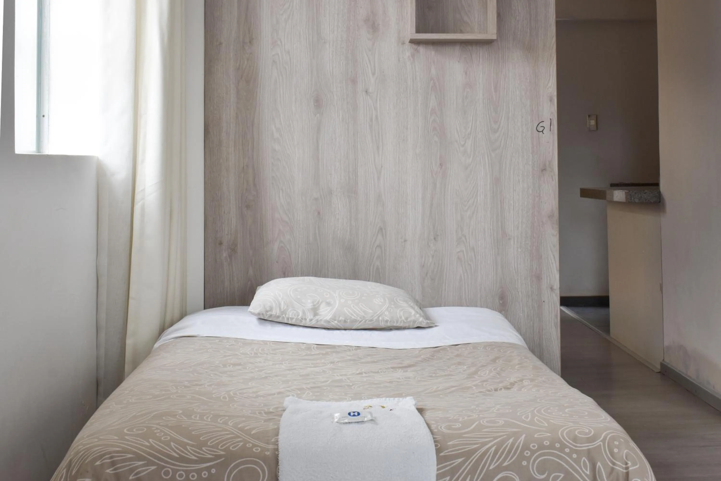 Bed in Apart Hotel El Puma