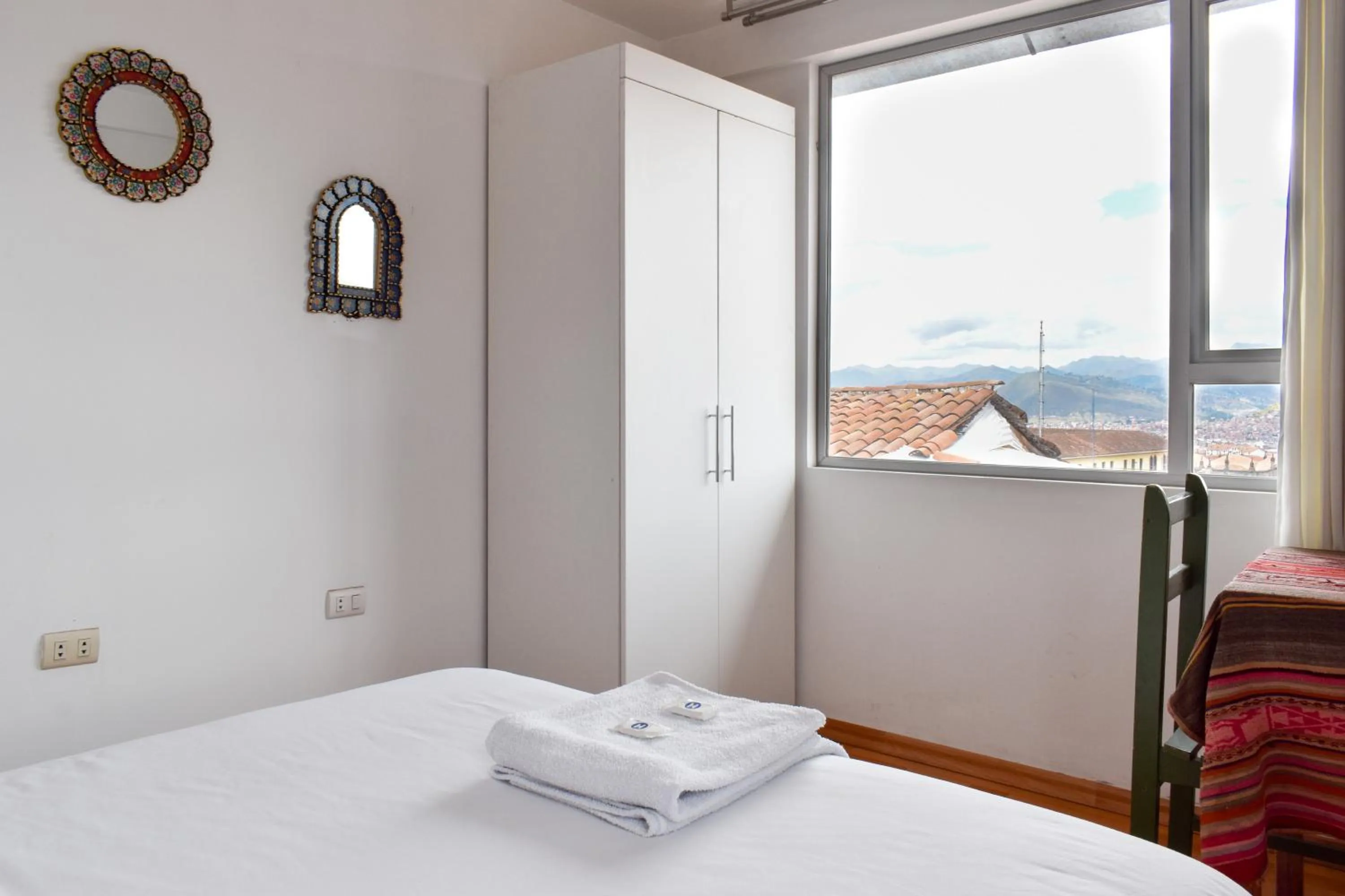 Bed in Apart Hotel El Puma