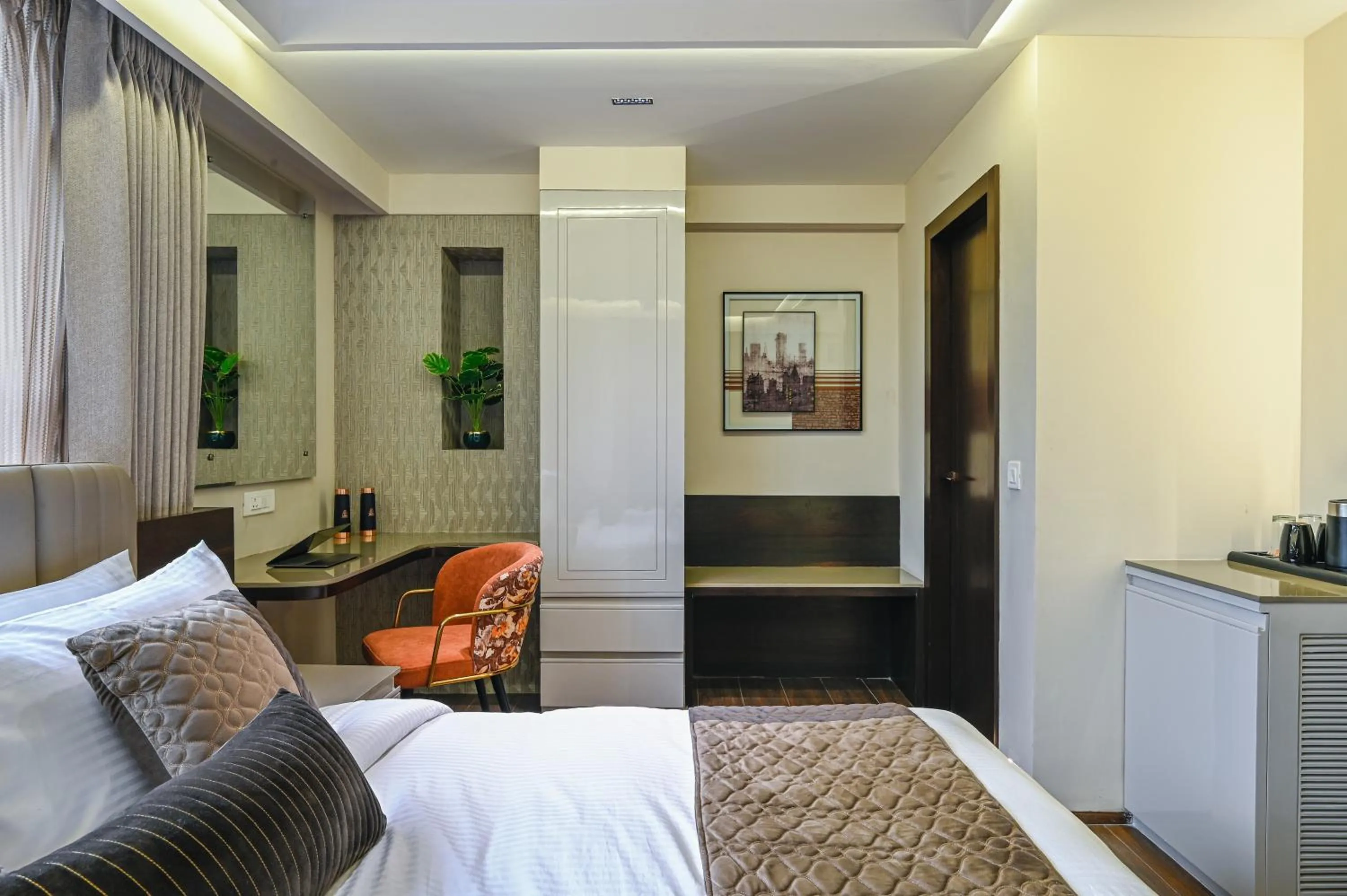 Bed in Hotel Grand Girdhar Premier