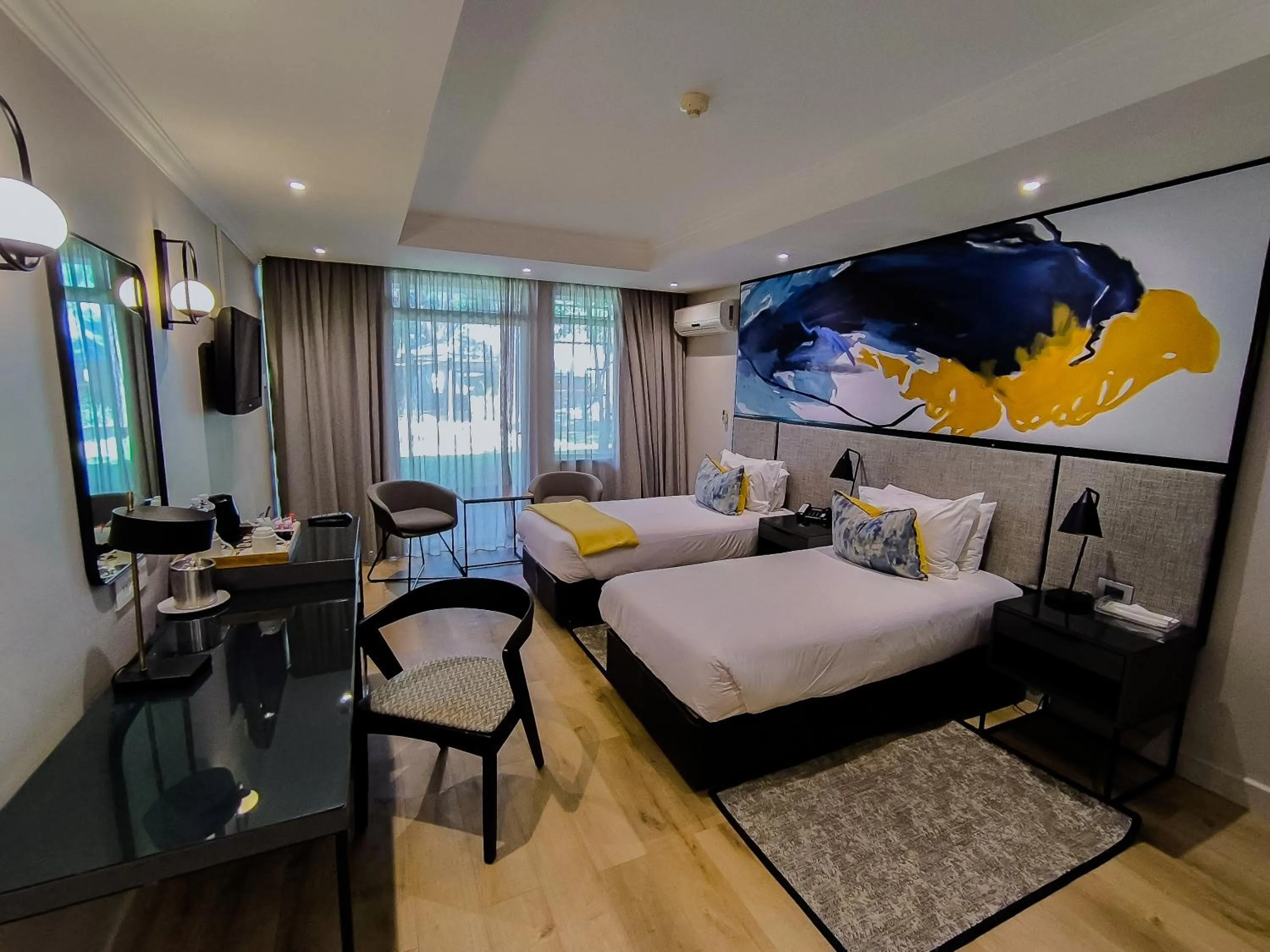 Photo of the whole room, Bed in Cresta Thapama Hotel