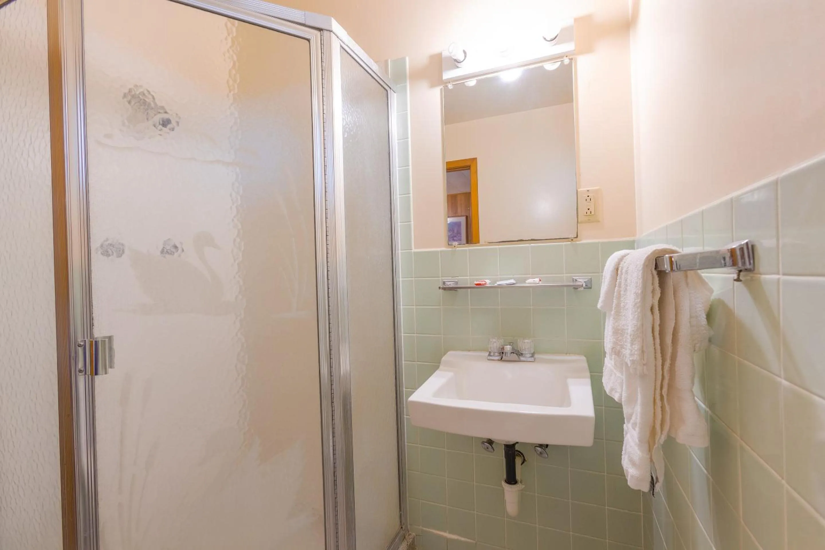 Bathroom in Parkside Motel by OYO Meadville Conneaut Lake