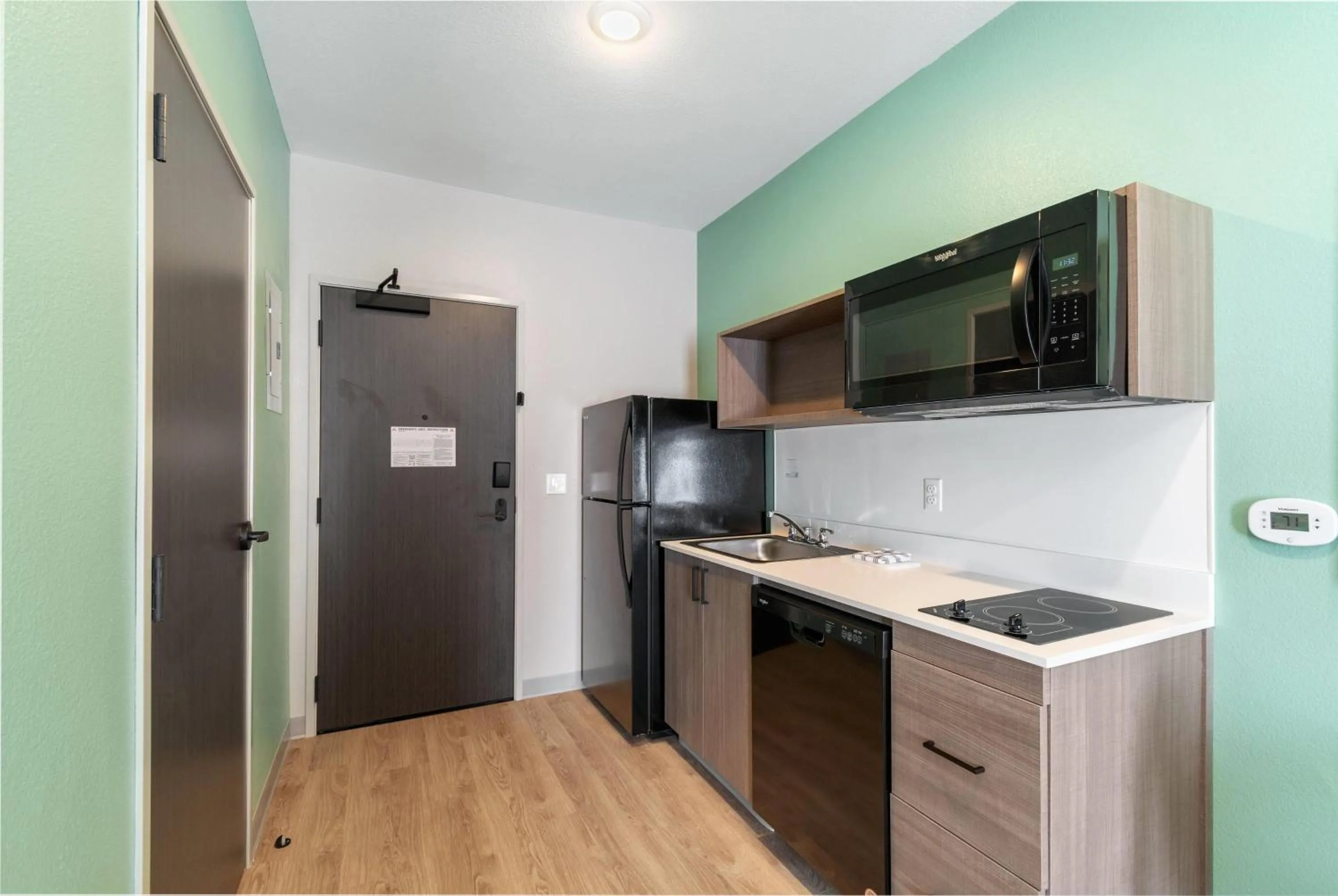 Kitchen or kitchenette in ECHO Suites Extended Stay by Wyndham Houston Katy West