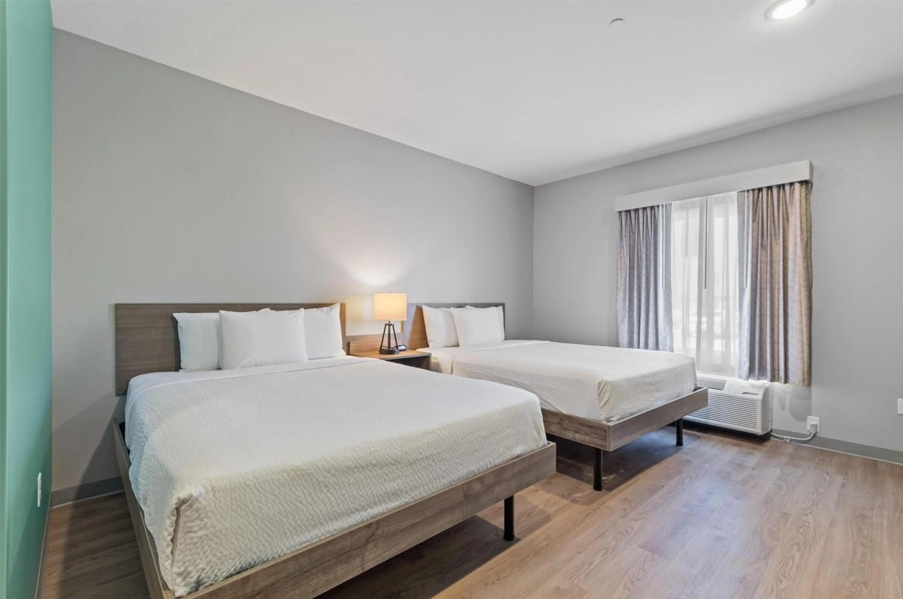 Photo of the whole room, Bed in ECHO Suites Extended Stay by Wyndham Houston Katy West