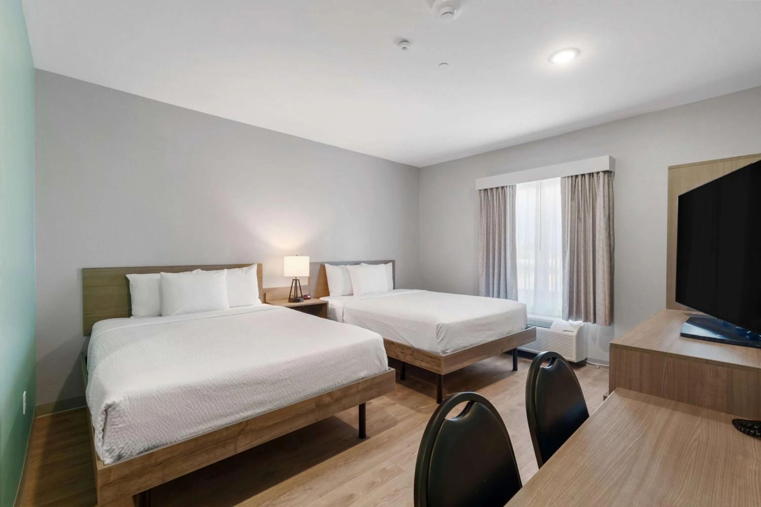 Photo of the whole room, Bed in ECHO Suites Extended Stay by Wyndham Houston Katy West