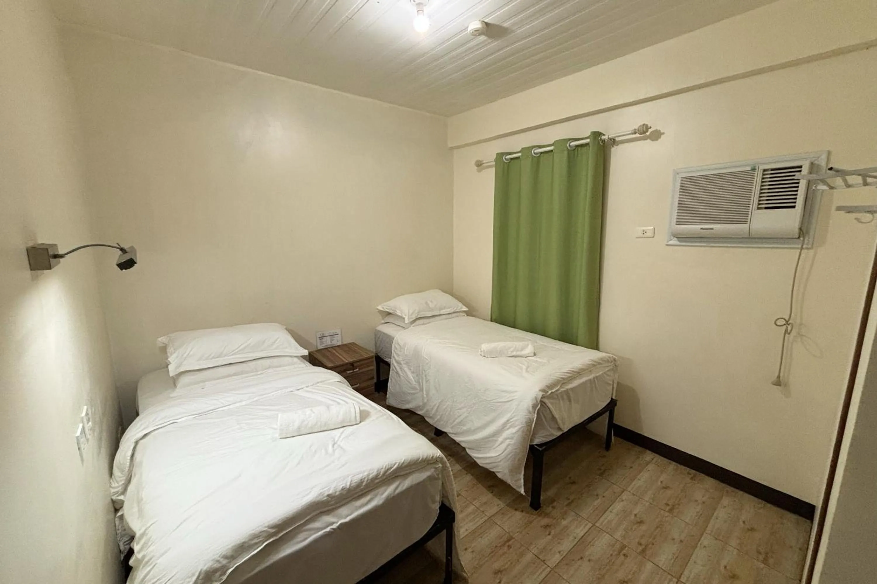 Bed in Pink Ocean Diving Resort Sabang Puerto Galera