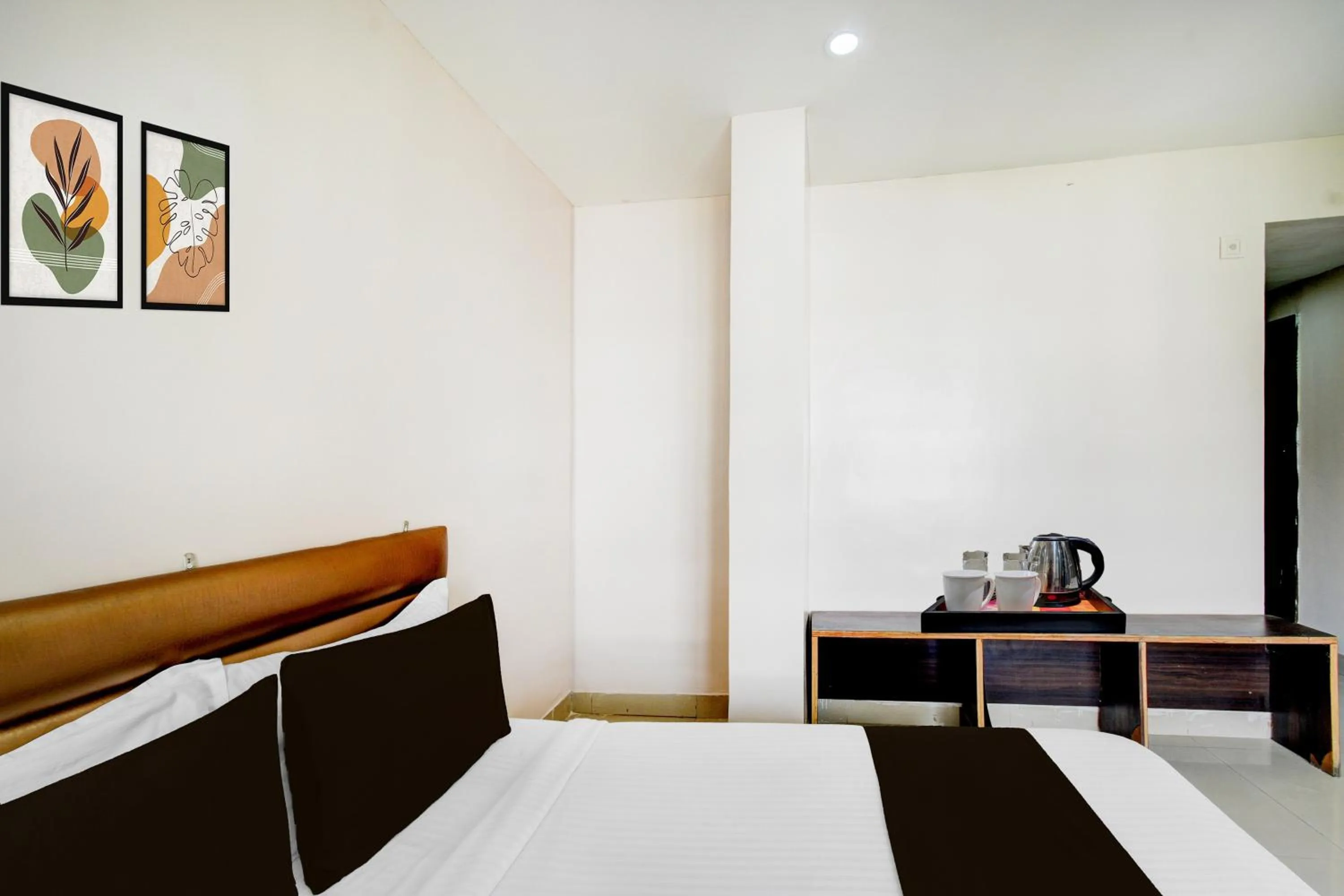 Bedroom, Bed in Super Townhouse Narayanaguda Metro Station Formerly Hotel Anshu Grand