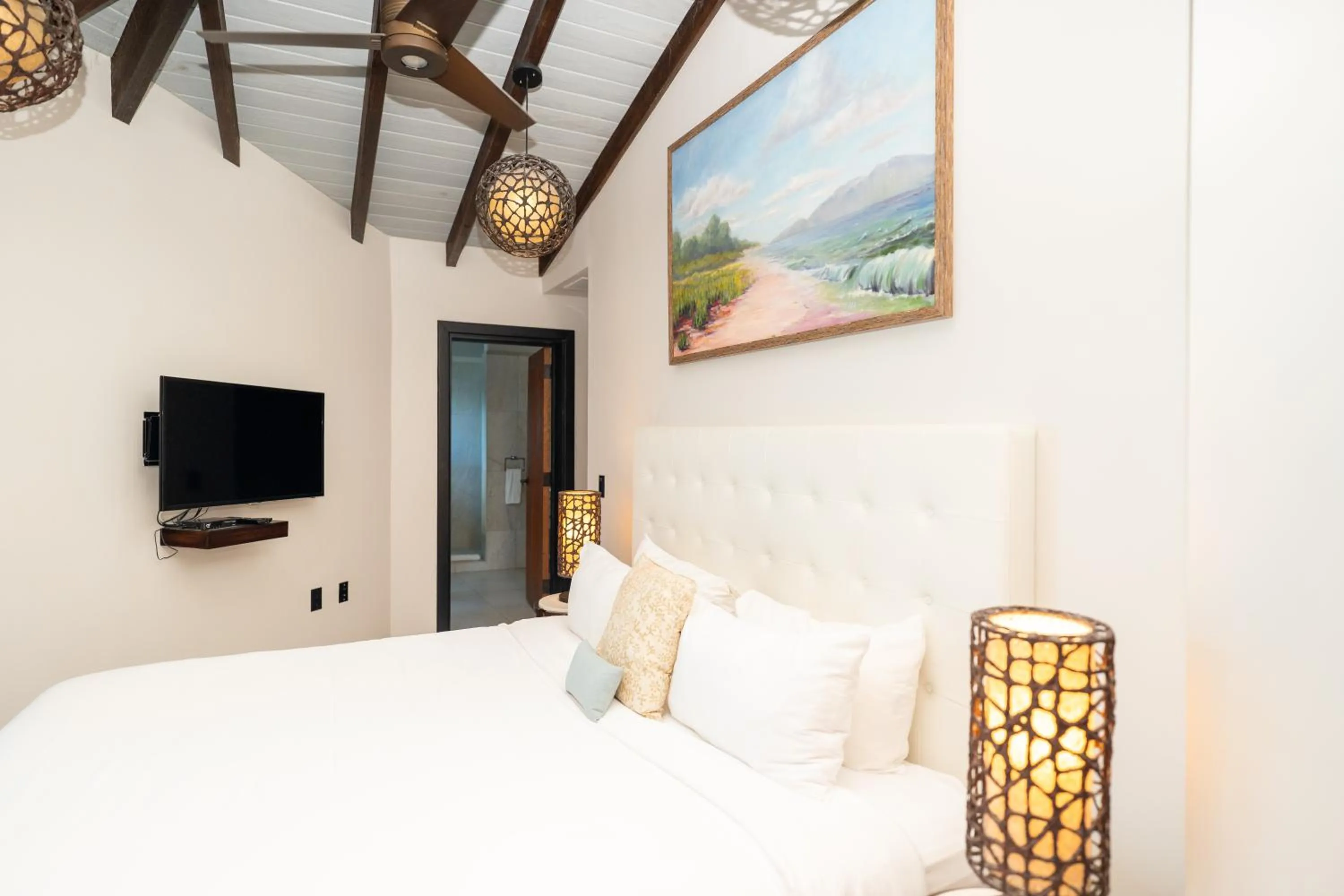 Bed in Tamarind Hills Resort & Villas