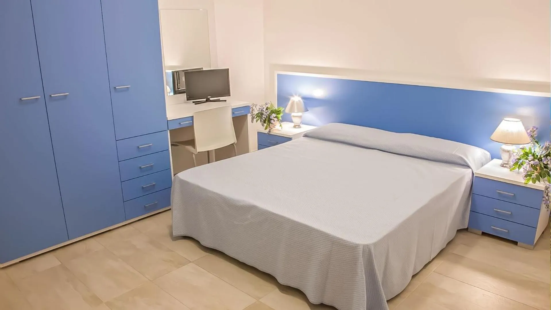 Bedroom in Villaggio & Residence Club Aquilia