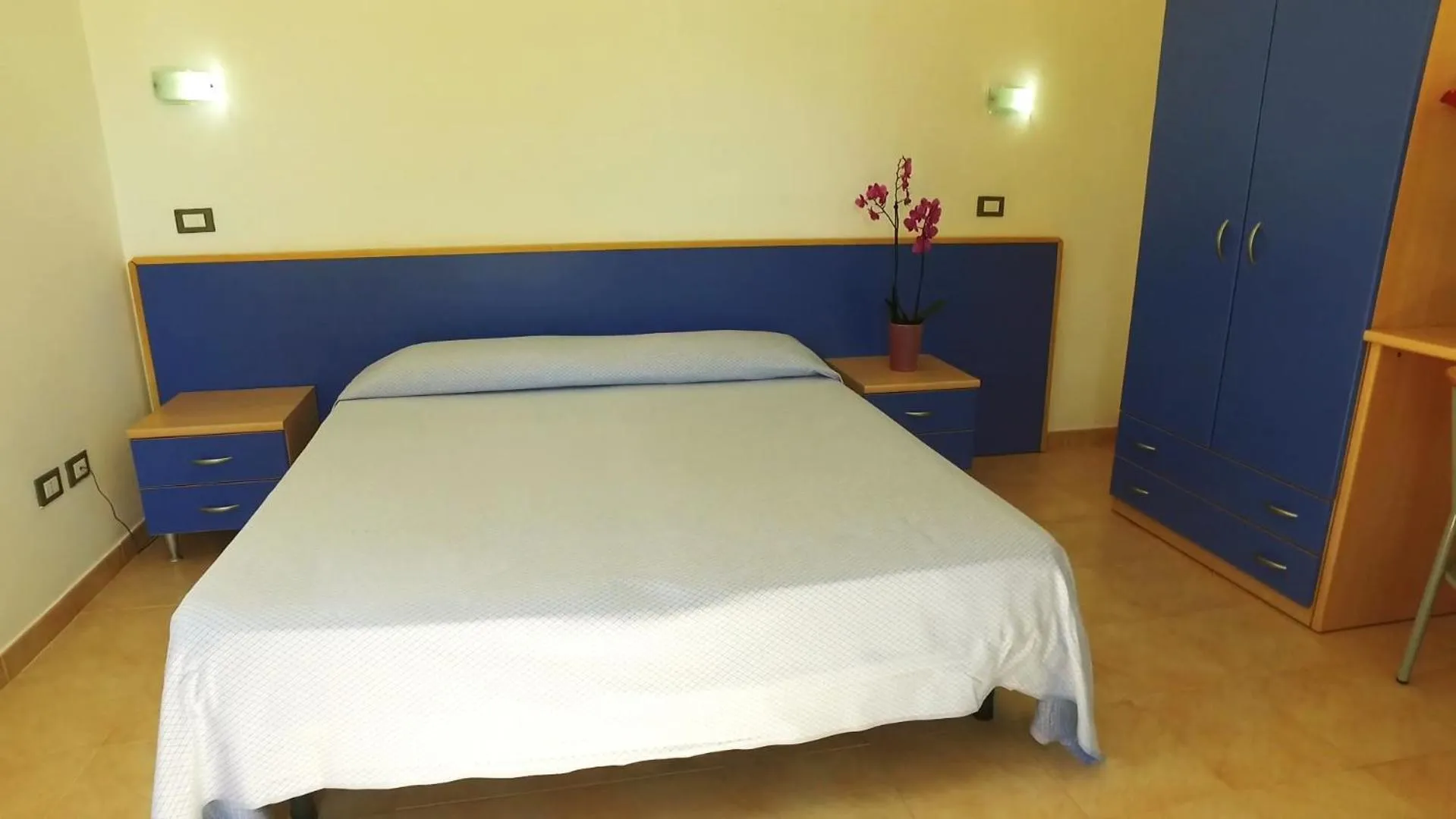 Bedroom in Villaggio & Residence Club Aquilia