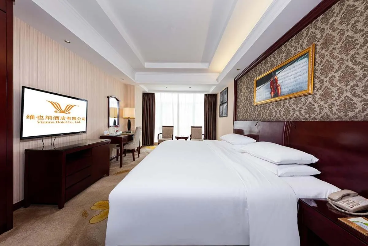 Bed in Vienna Hotel Xinyu Kaiguang