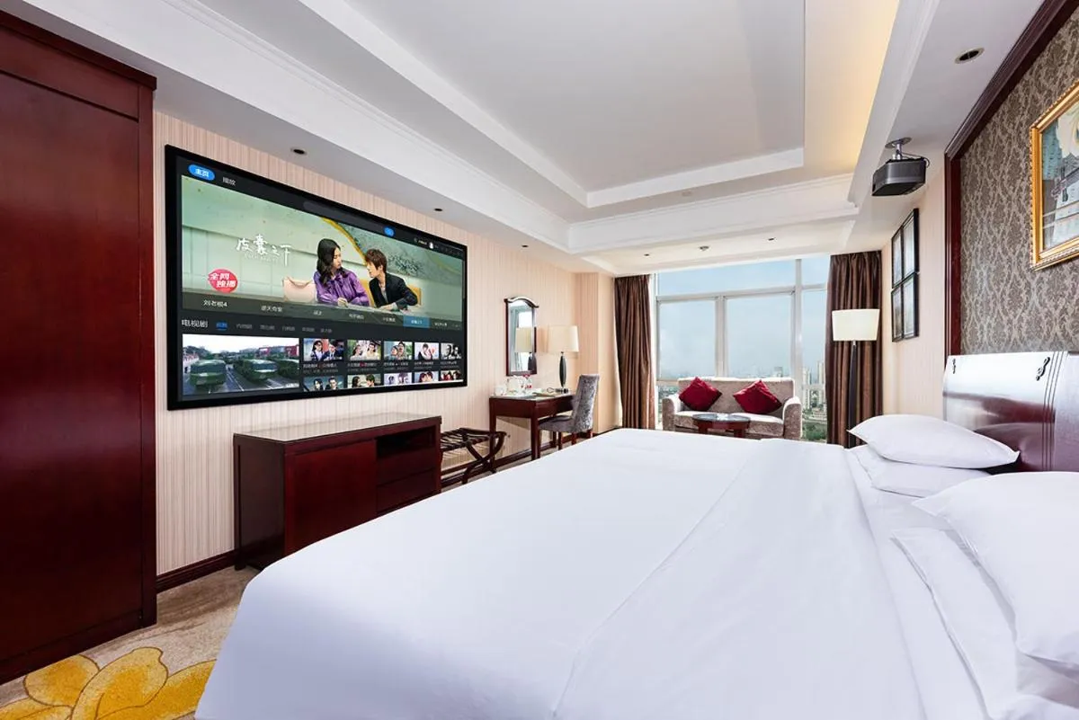 Bed in Vienna Hotel Xinyu Kaiguang