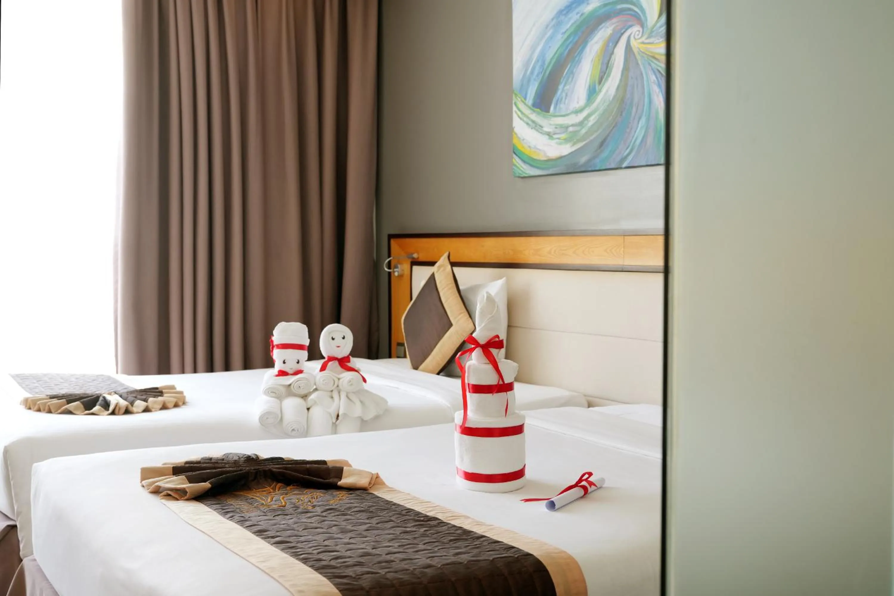 Bed in Dragon Sea Hotel