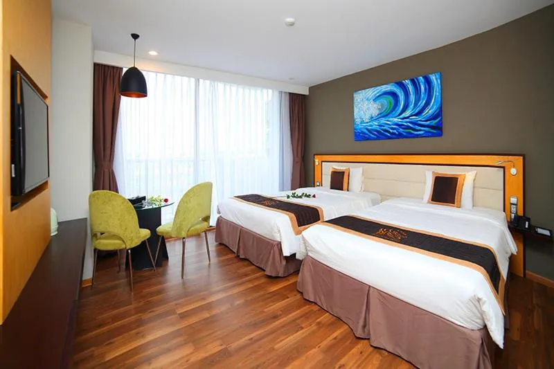 Bed in Dragon Sea Hotel