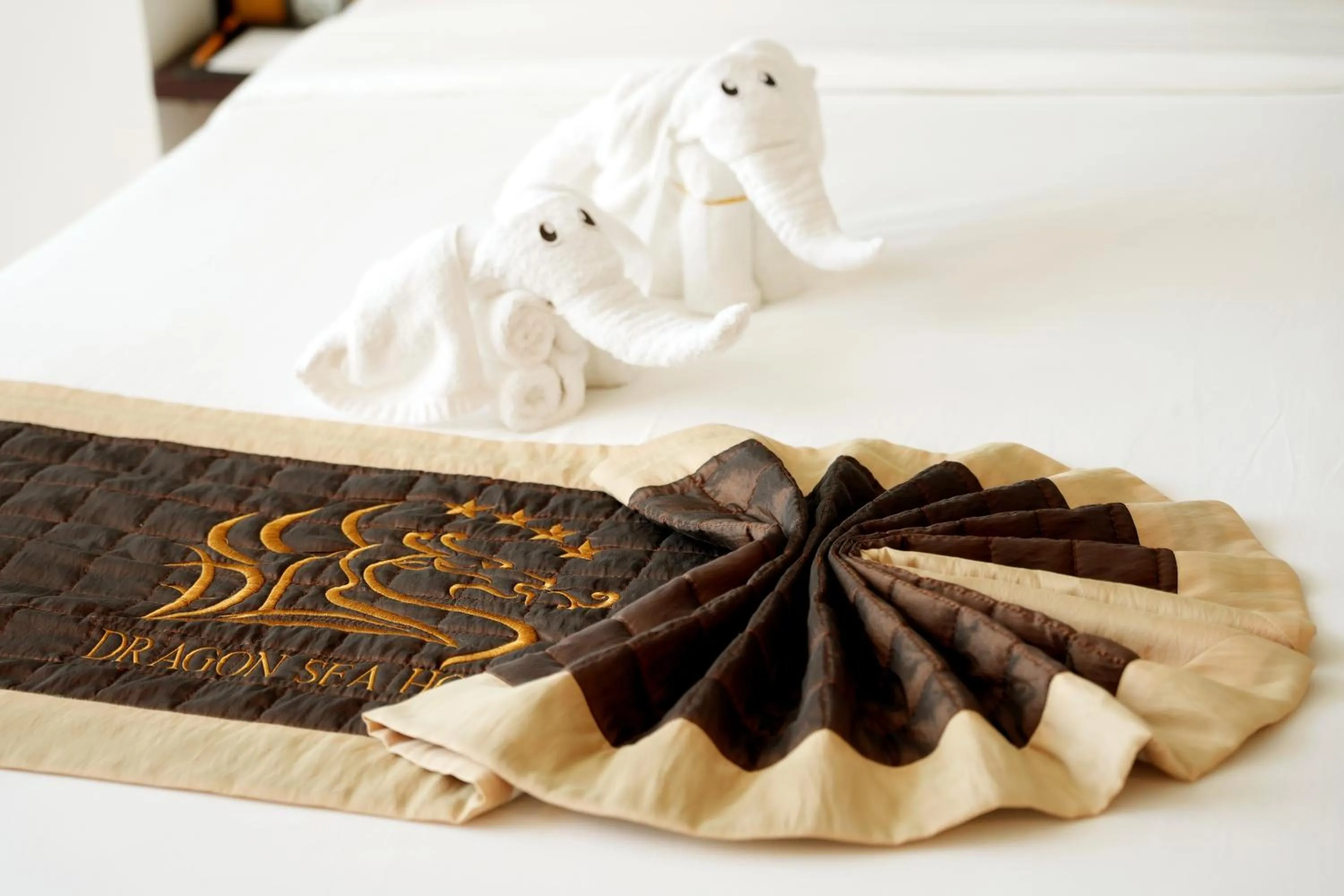 Bed in Dragon Sea Hotel