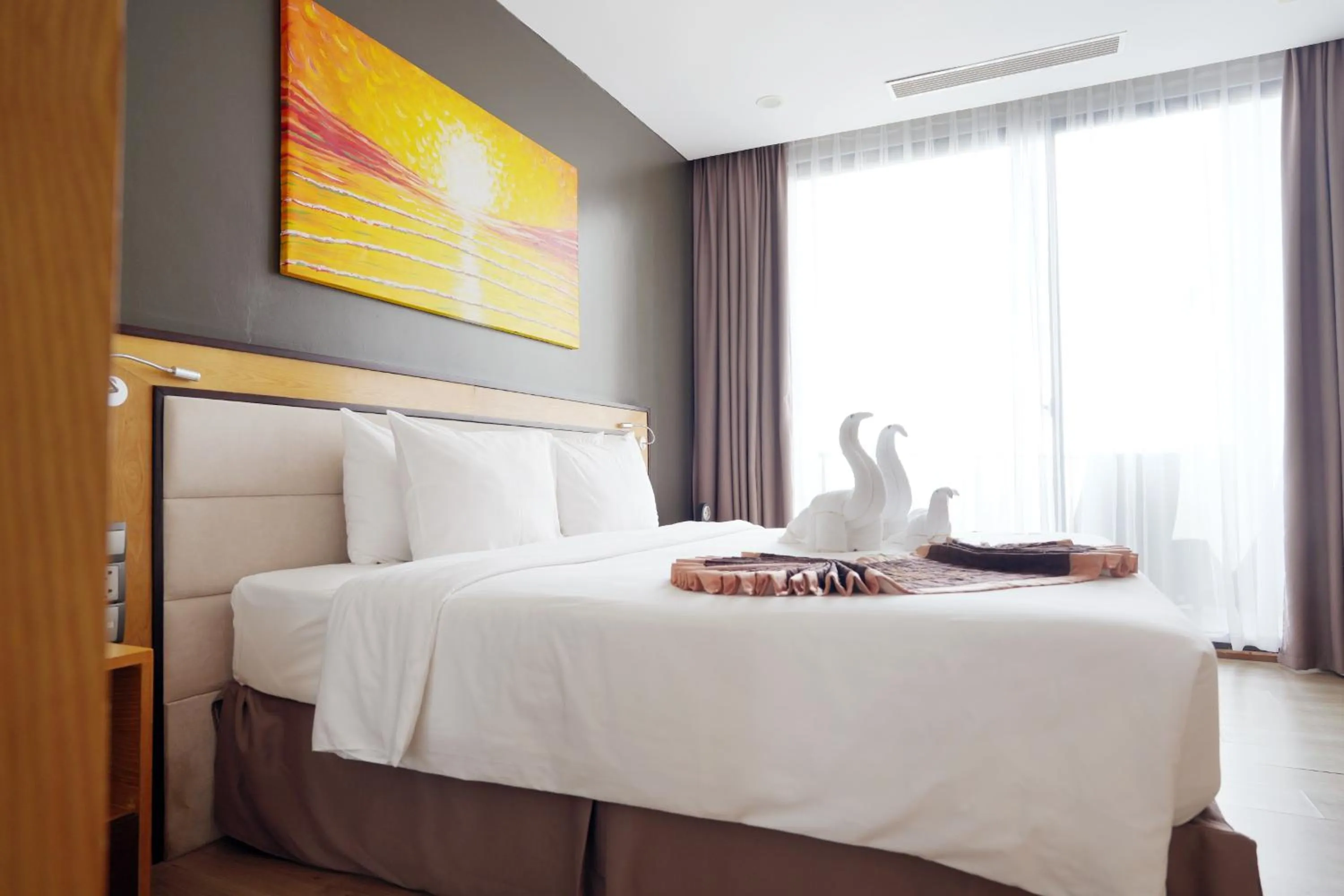 Bed in Dragon Sea Hotel