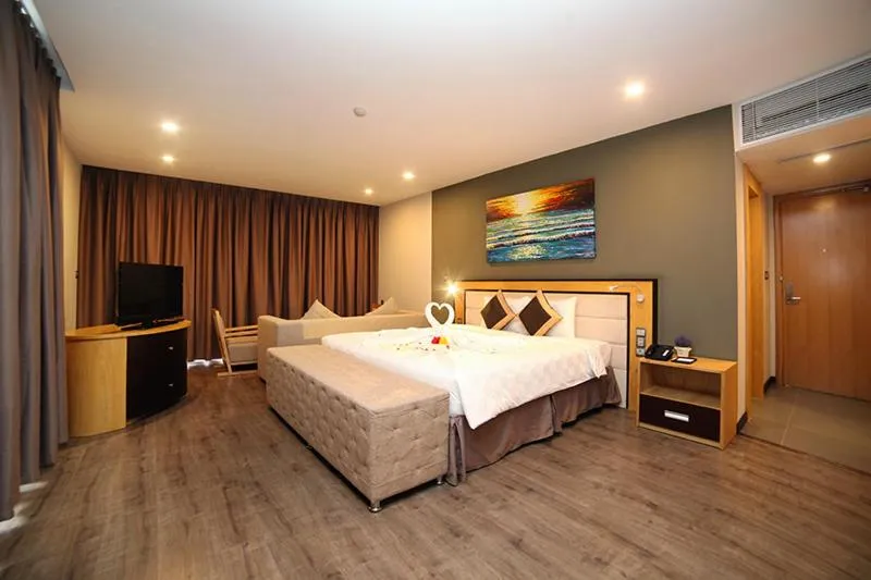 Bed in Dragon Sea Hotel