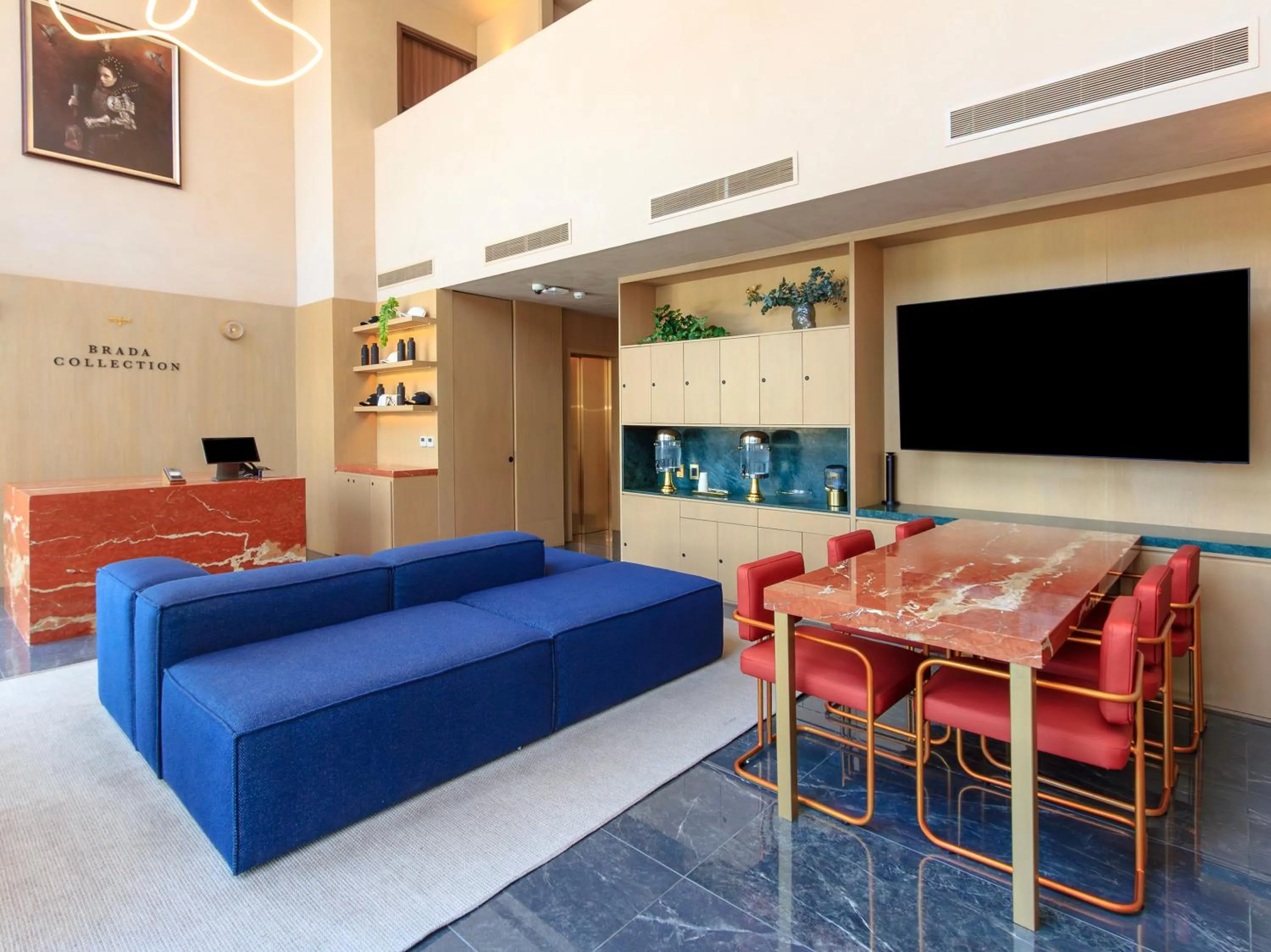 Communal lounge/ TV room in Brada Collection Stays