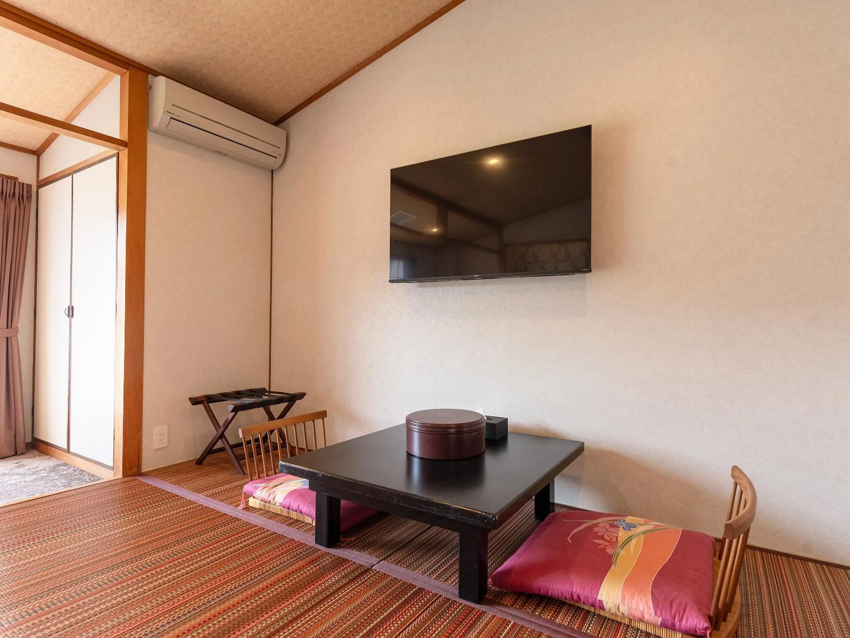 Bed in Livemax Resort Yuhigaura Kitu Onsen