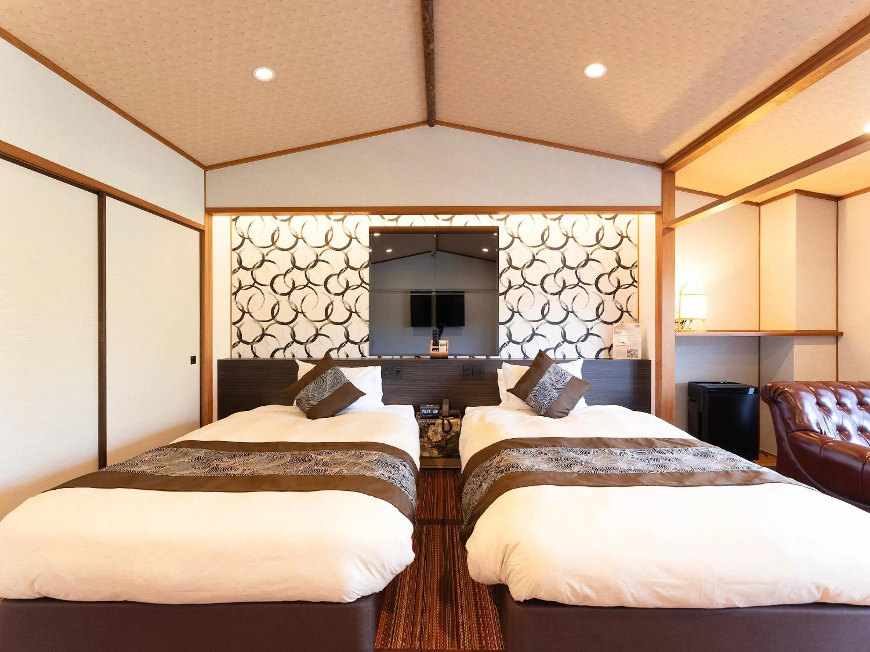 Bed in Livemax Resort Yuhigaura Kitu Onsen