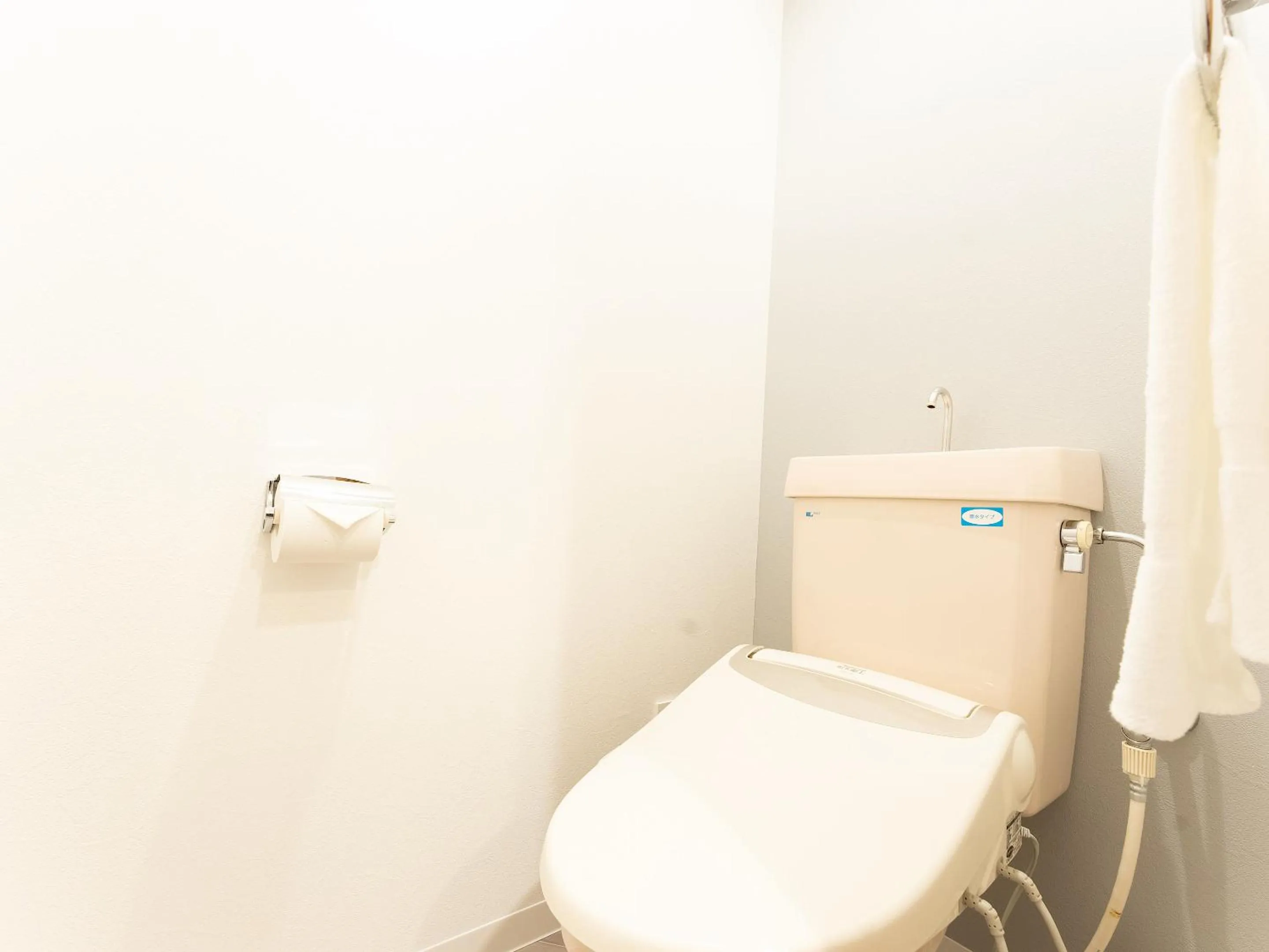 Toilet in Livemax Resort Yuhigaura Kitu Onsen