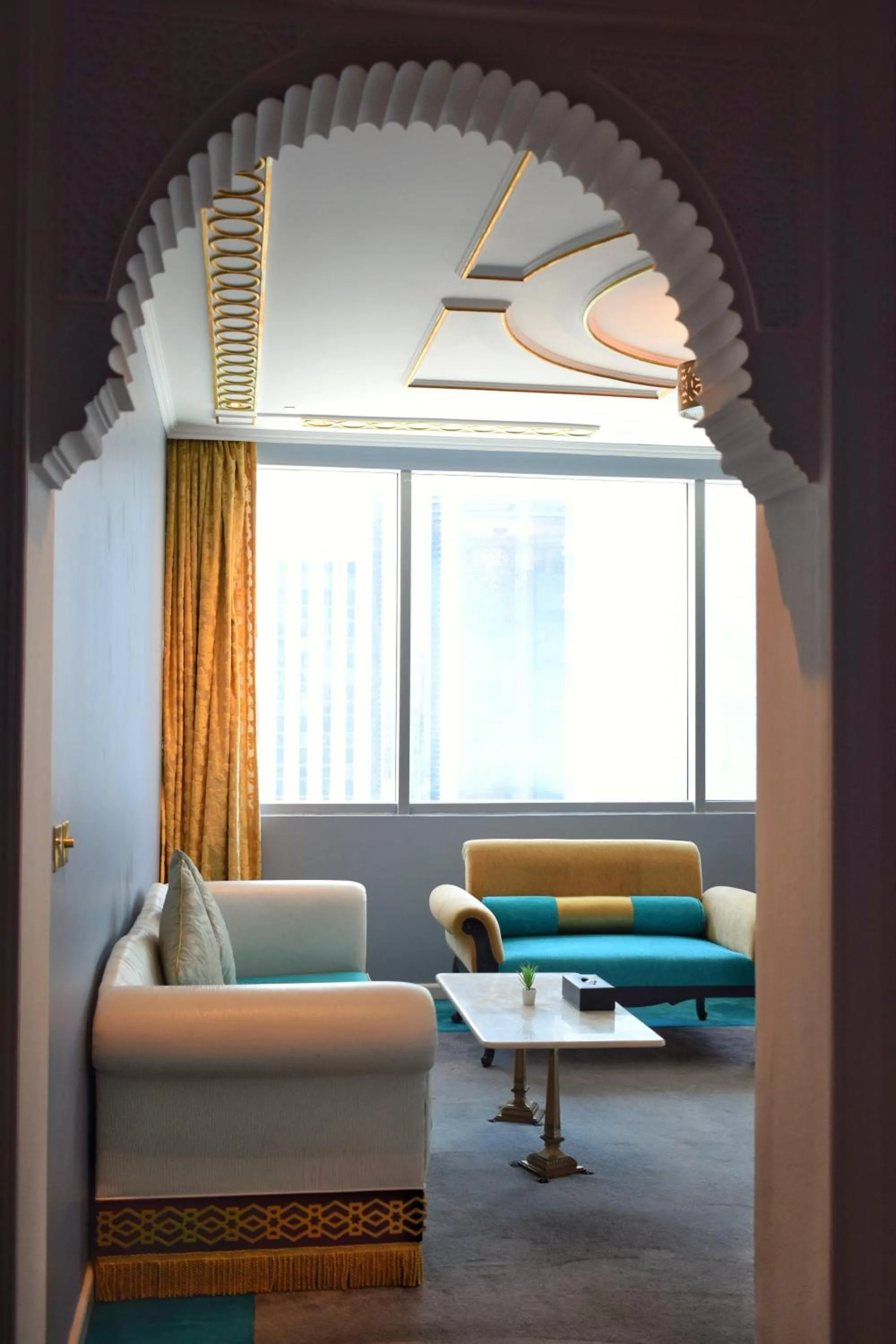 Living room, Bed in Saraya Corniche Hotel